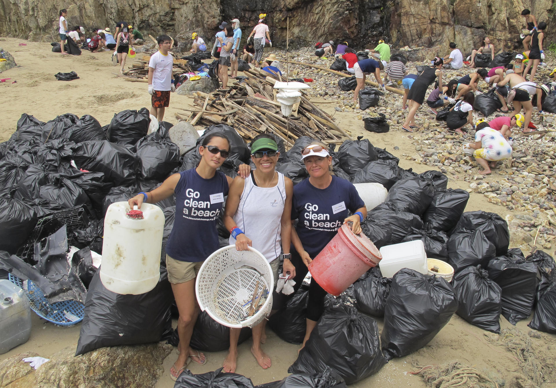 Nissa Marion (left) and Lisa Christensen (right) at a beach cleanup.