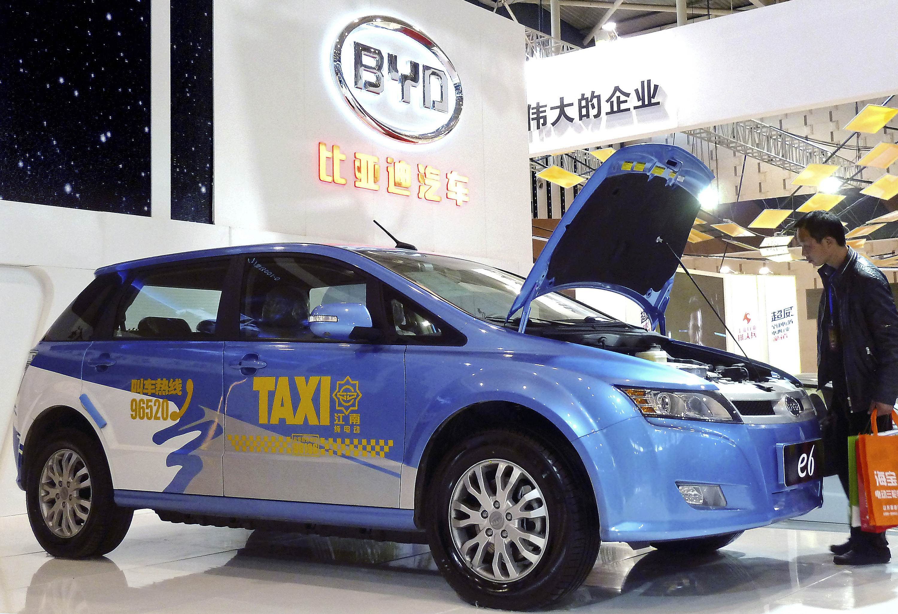 A BYD electric car on display in China as the company plans to raise 15 billion yuan from a share placement. Photo: Reuters