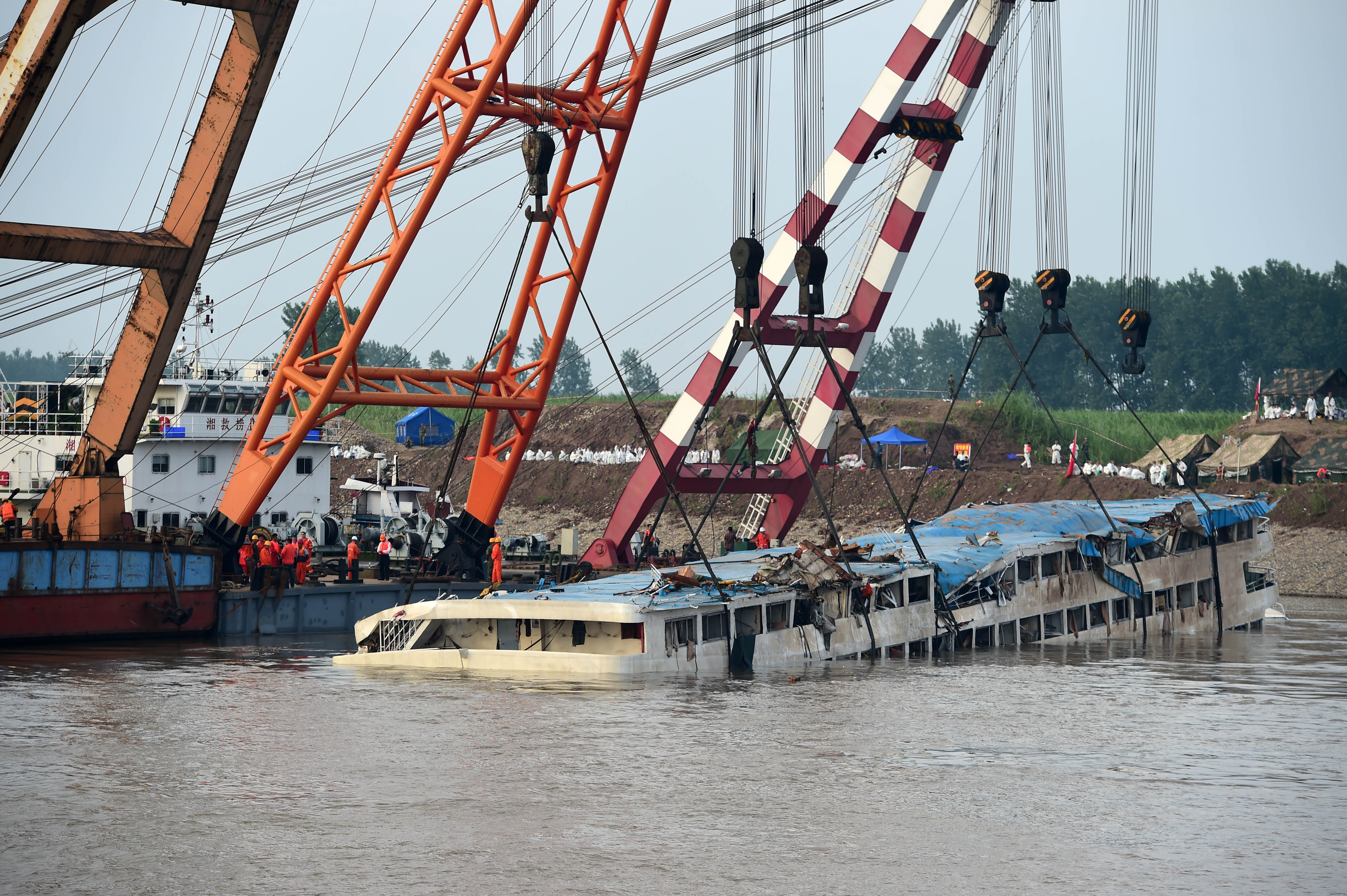 The capsized cruise ship Eastern Star as it was hoisted in the section of Jianli on the Yangtze River. Photo: Xinhua