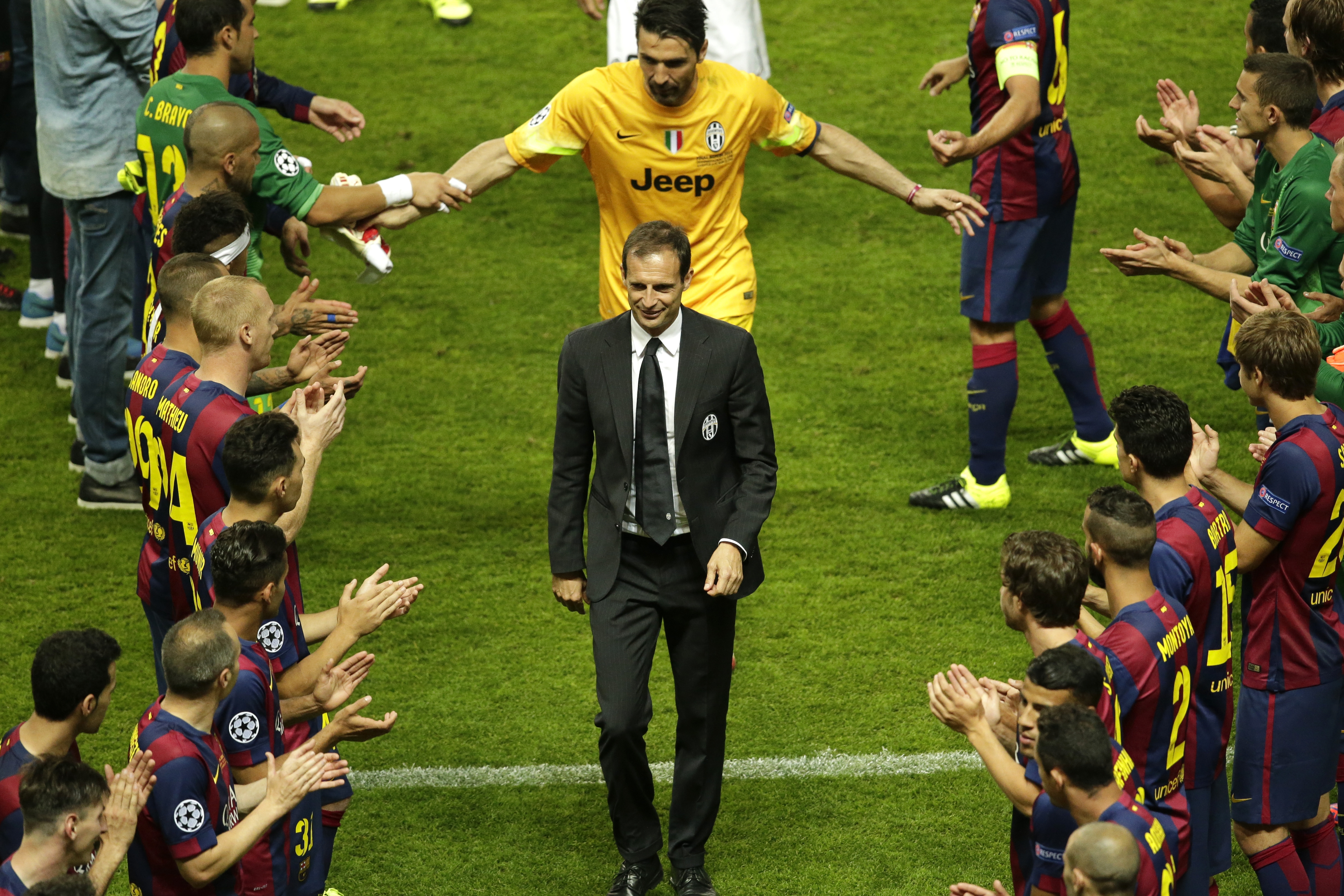 Barcelona players clap as Massimiliano Allegri leads his players off the field. Photo: AP
