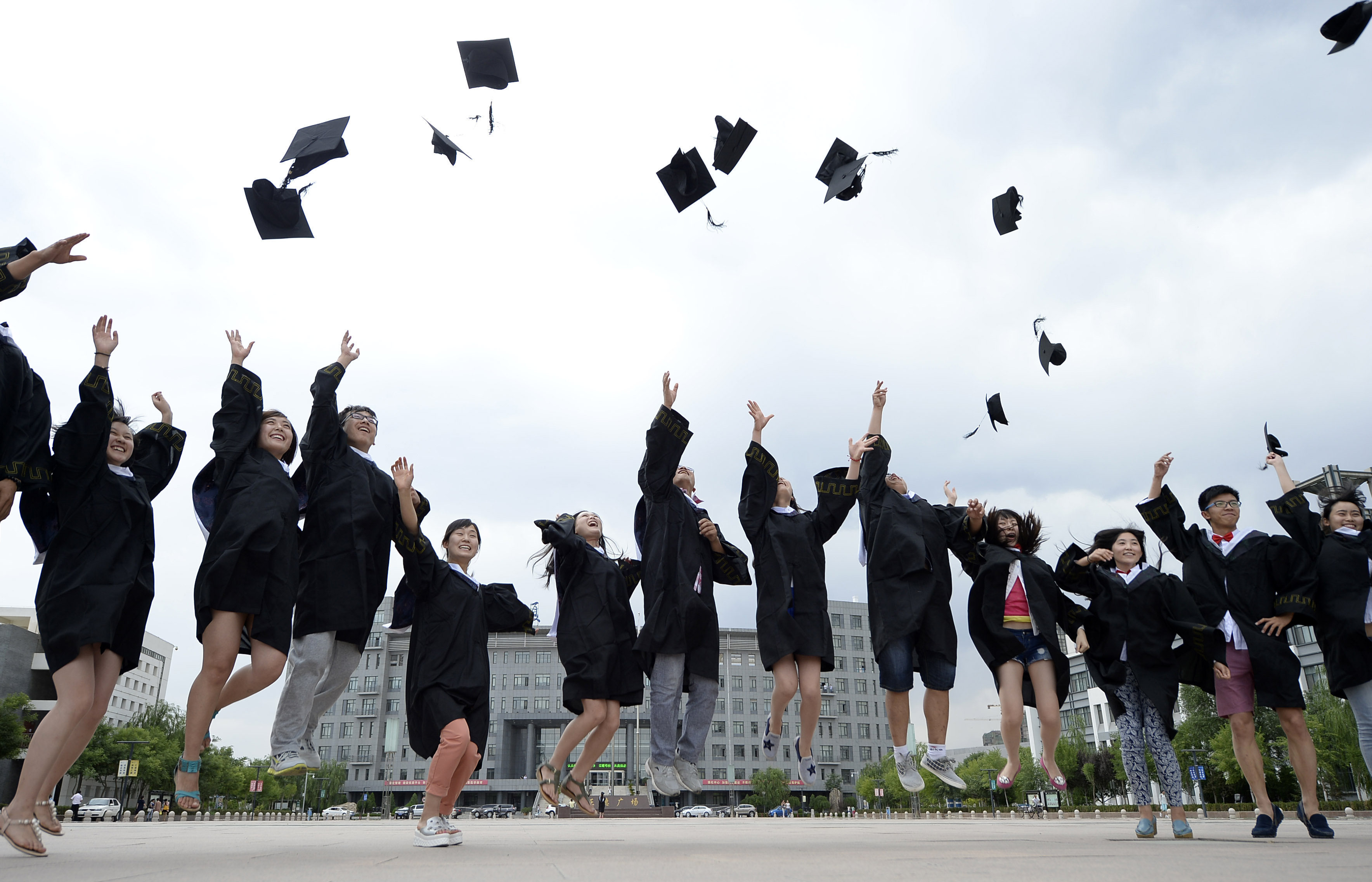 China's computing graduates have reason to jump for joy as study reveals those who go into computing jobs are the highest-paid among all professions. Photo: Xinhua