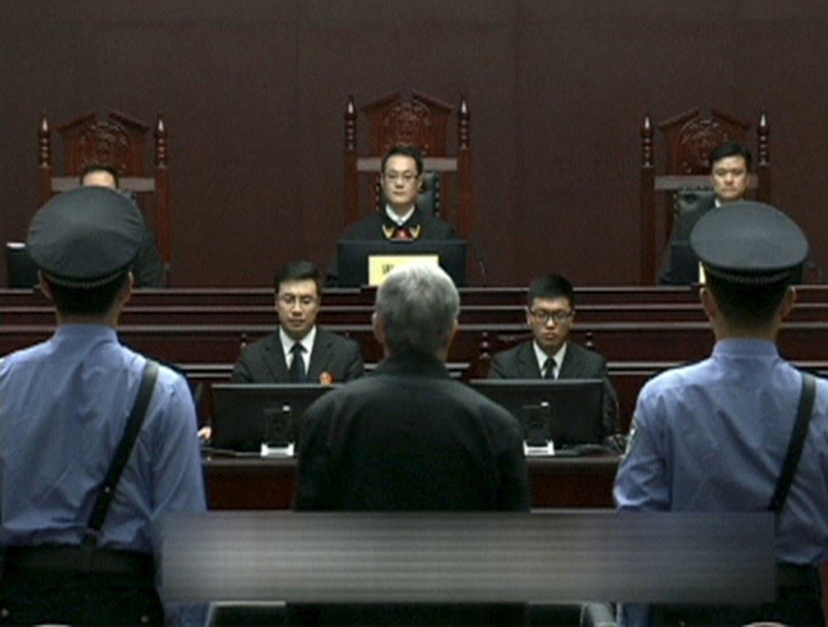 Zhou Yongkang listens as his sentence is read. Photo: Reuters