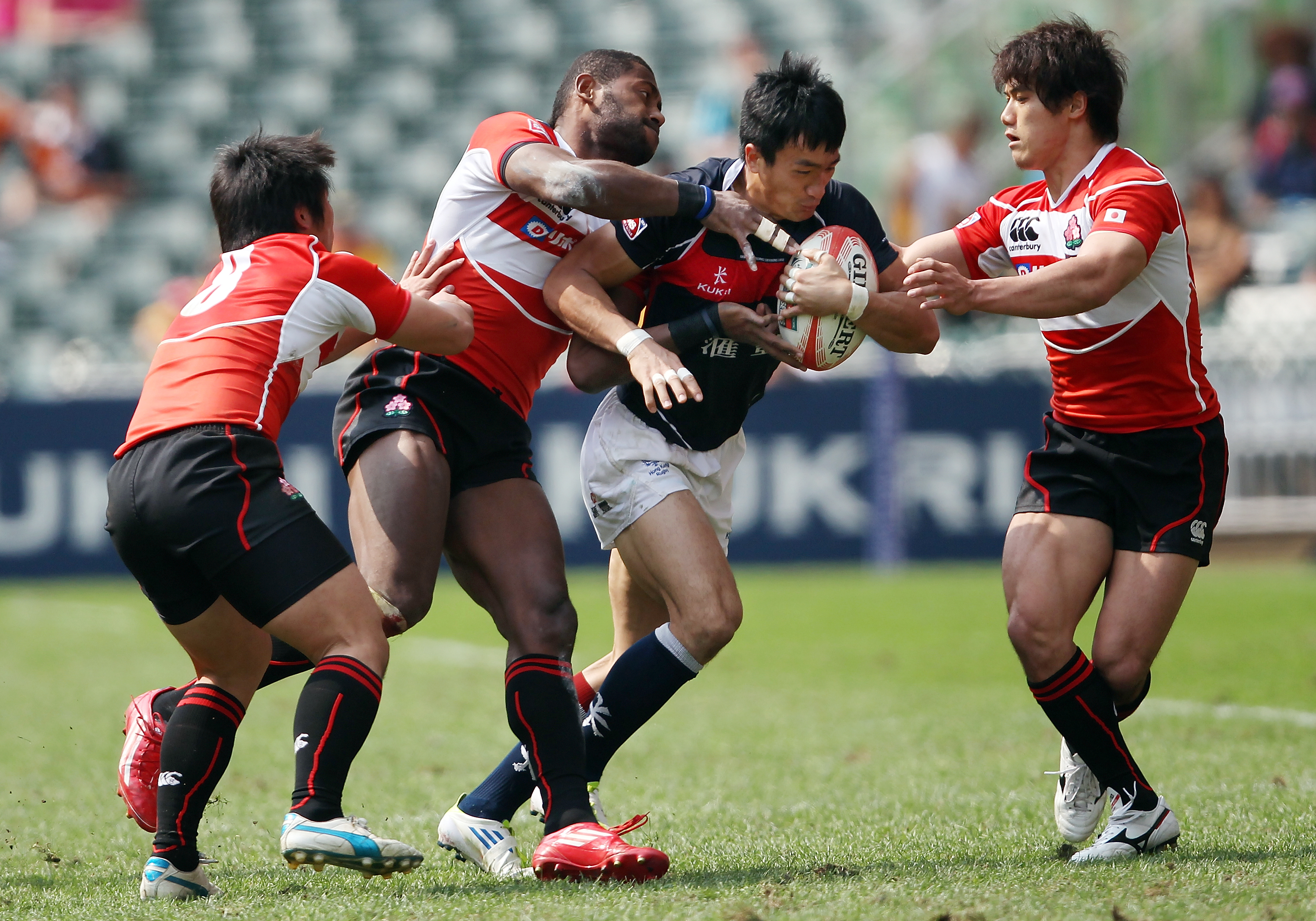 Hong Kong will probably have to overcome nemesis Japan to win the Asian qualifier. Photos: HKRFU
