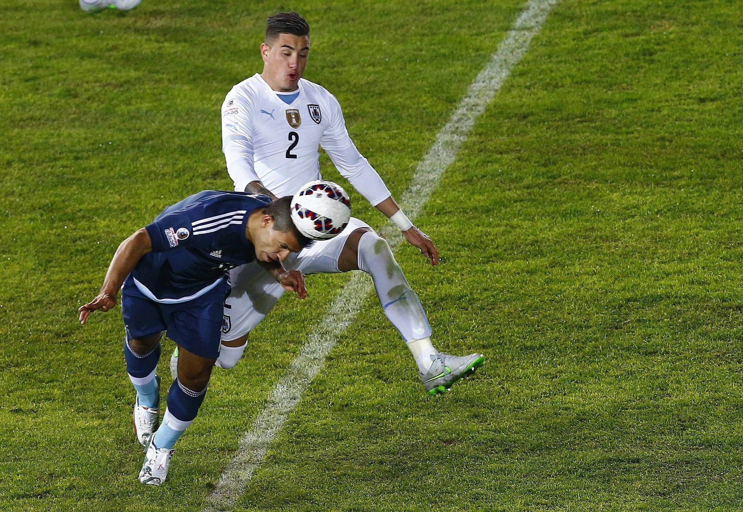 Sergio Aguero sticks his head in to score for Argentina. Photo: EPA