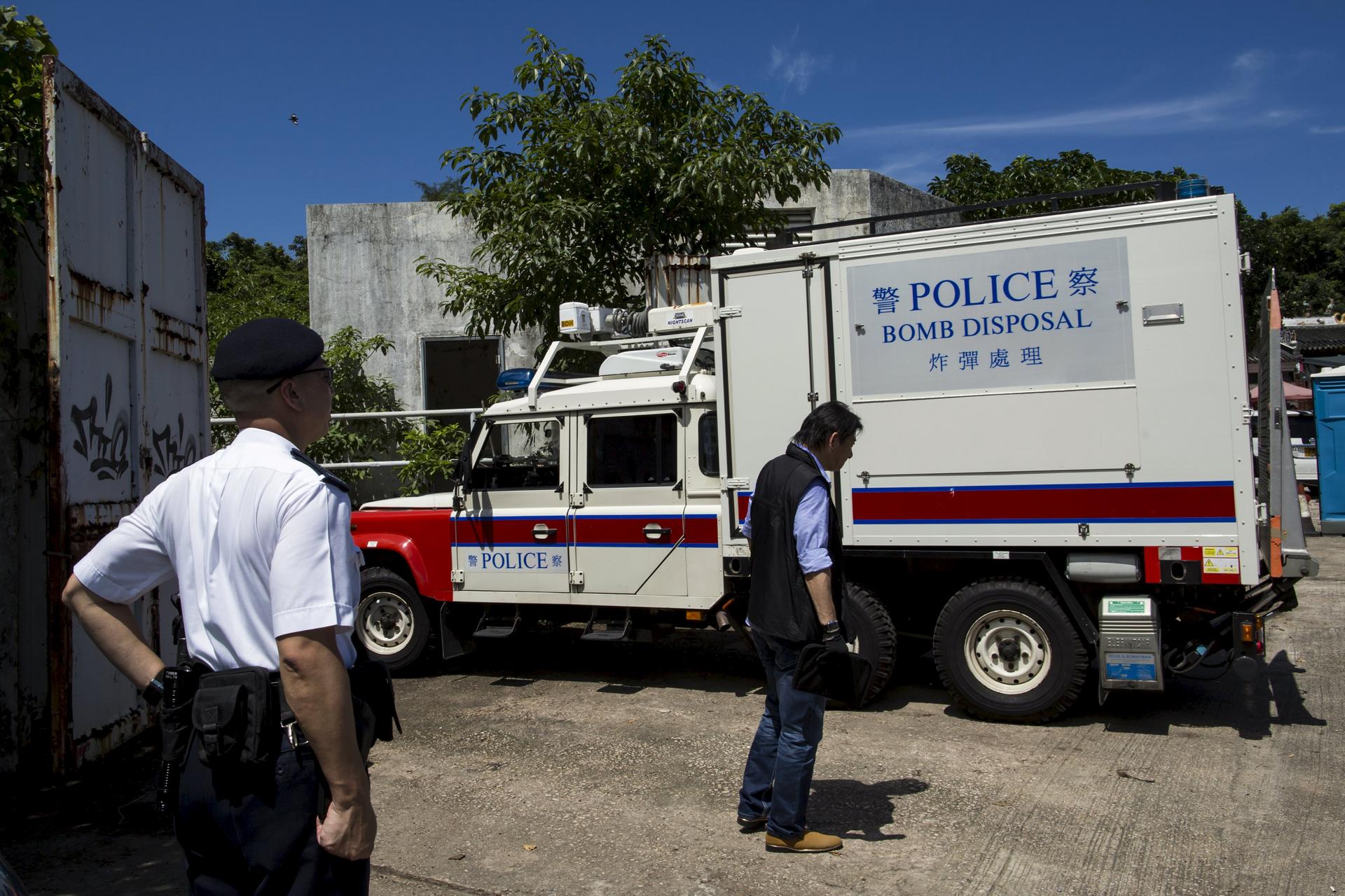A police bomb disposal vehicle enters the former ATV studio where explosives were seized. Photo: Reuters