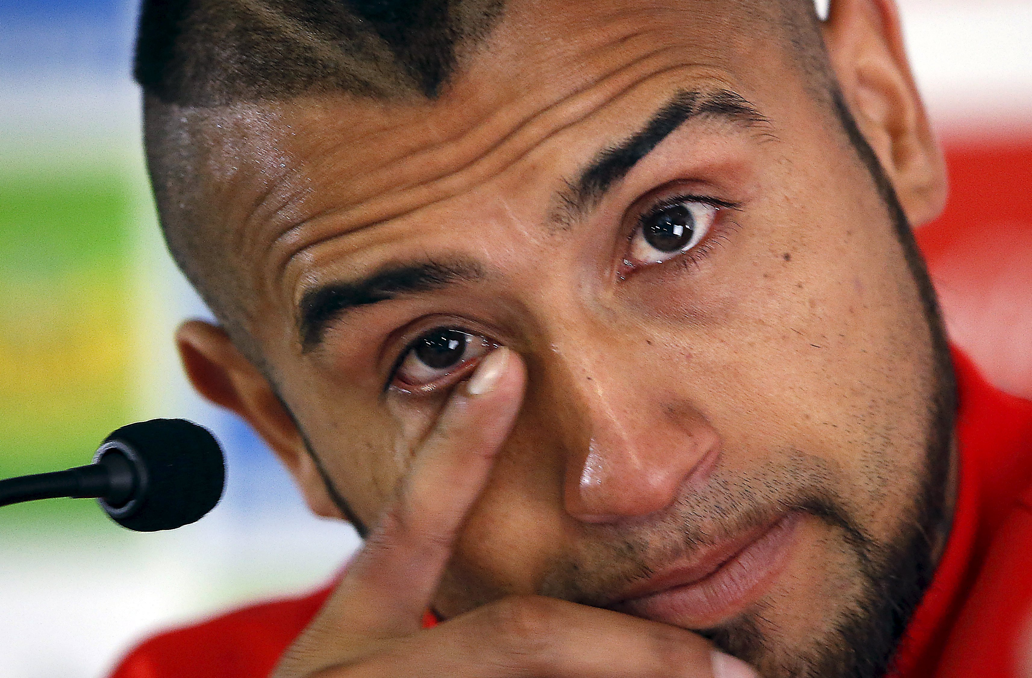 Arturo Vidal's demeanour was in stark contrast to YouTube video of him berating police. Photo: Reuters