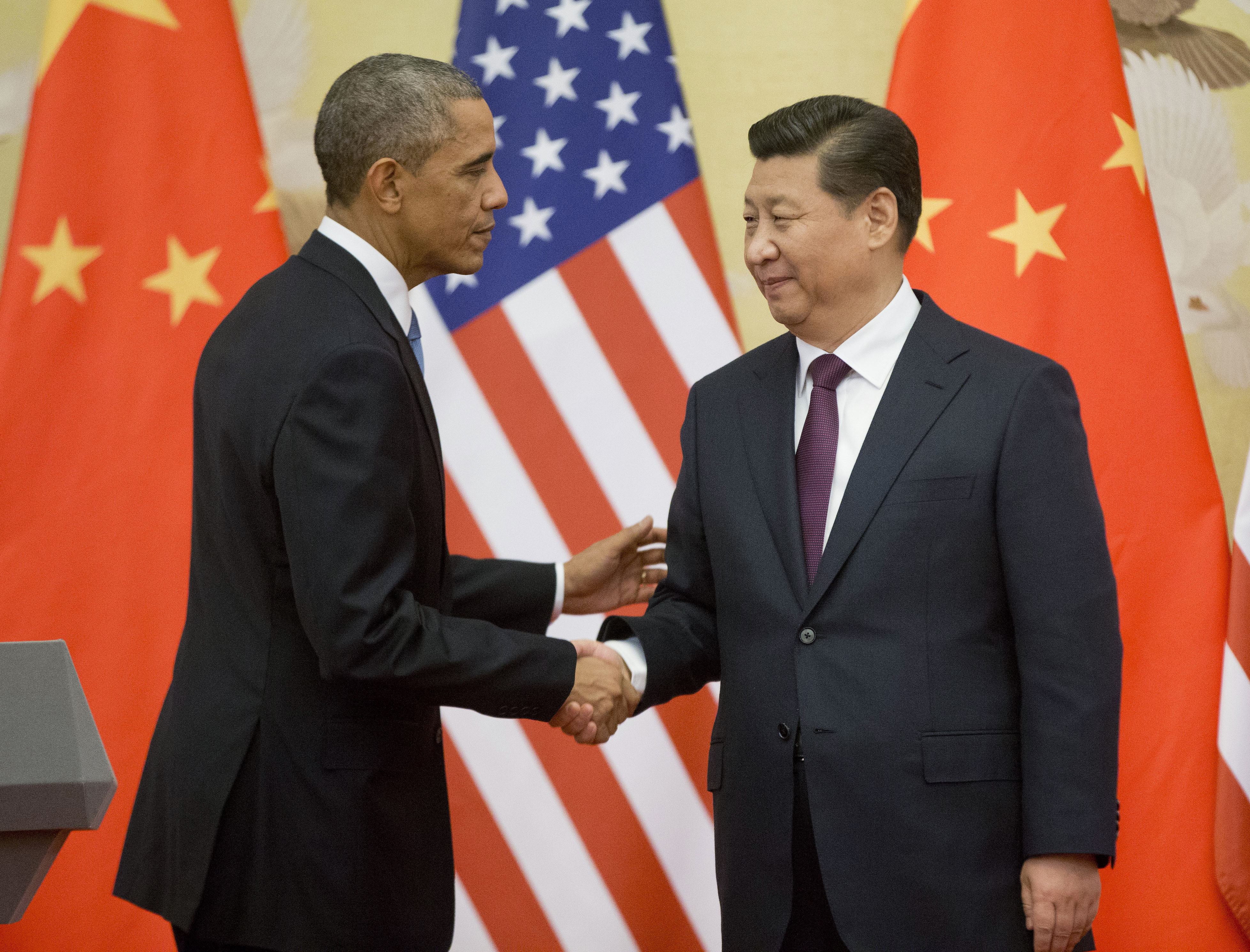 US President Barack Obama and Chinese President Xi Jinping at the conclusion of their joint news conference  in Beijing last year. Photo: AP