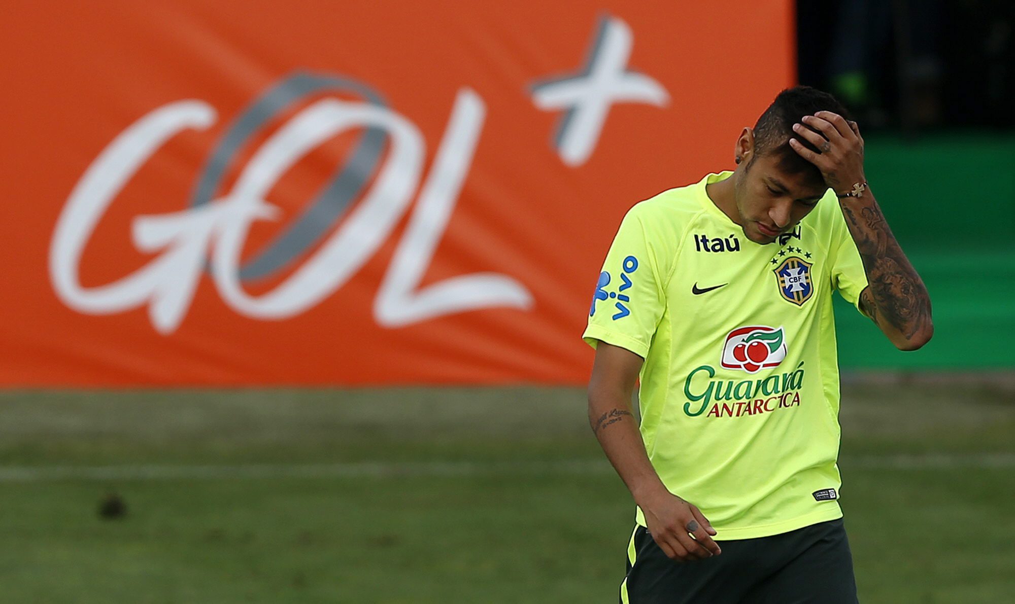 Neymar hangs his head at a training session ahead of the announcement of his ban. Photo: EPA