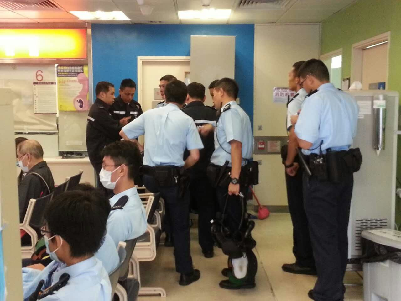 Police investigate at Queen Elizabeth Hospital in Yau Ma Tei. Photo: SCMP Pictures