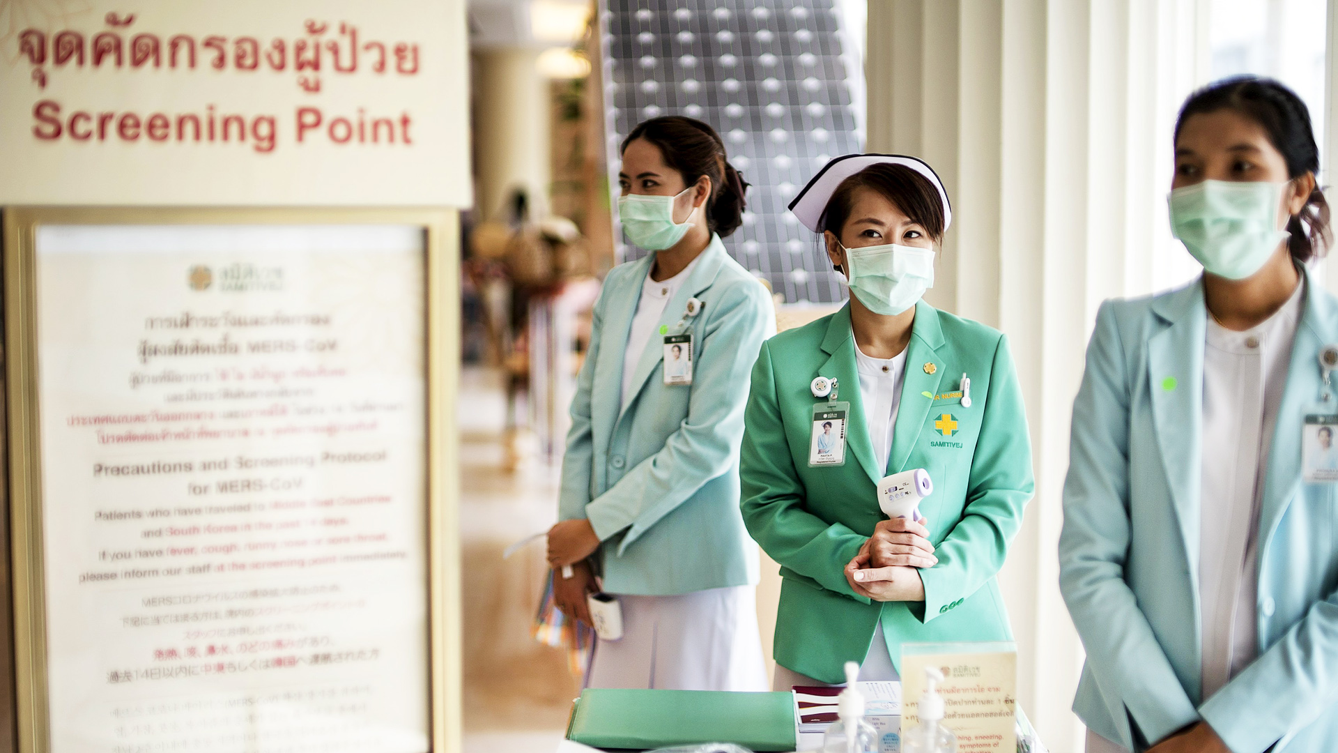Medical personnel wear masks to prevent contracting Middle East Respiratory Syndrome (MERS) as they work at a screening point at a private hospital in Bangkok. Photo: Reuters 