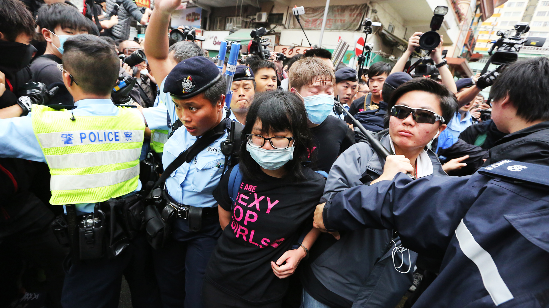 He touched me': Woman protester counters Hong Kong policeman's claim she  'attacked' him with her breast