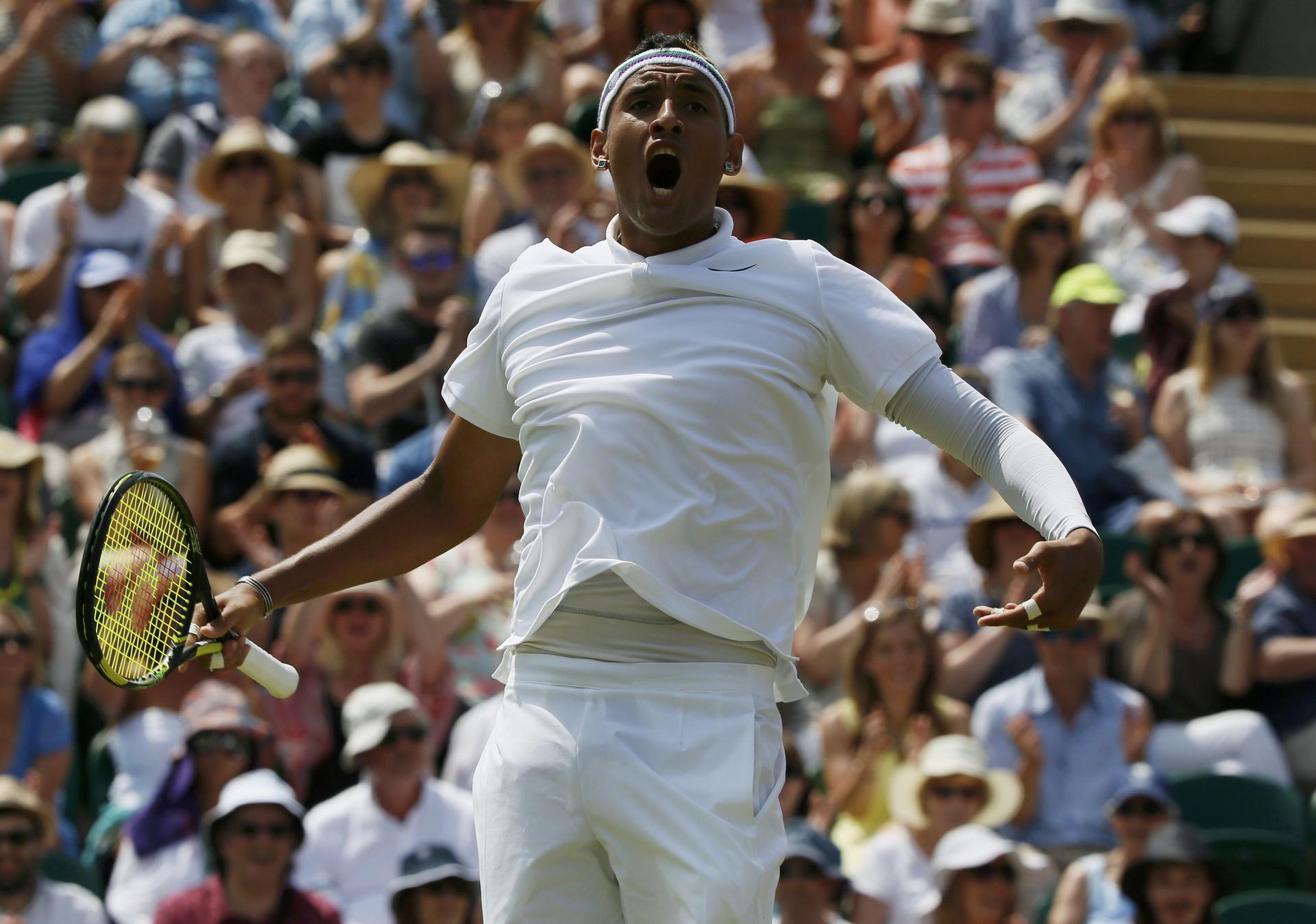Australian Nick Kyrgios is fired up during his third-round match against Milos Raonic of Canada. Kyrgios had a four-set win over the seventh seed. Photo: Reuters