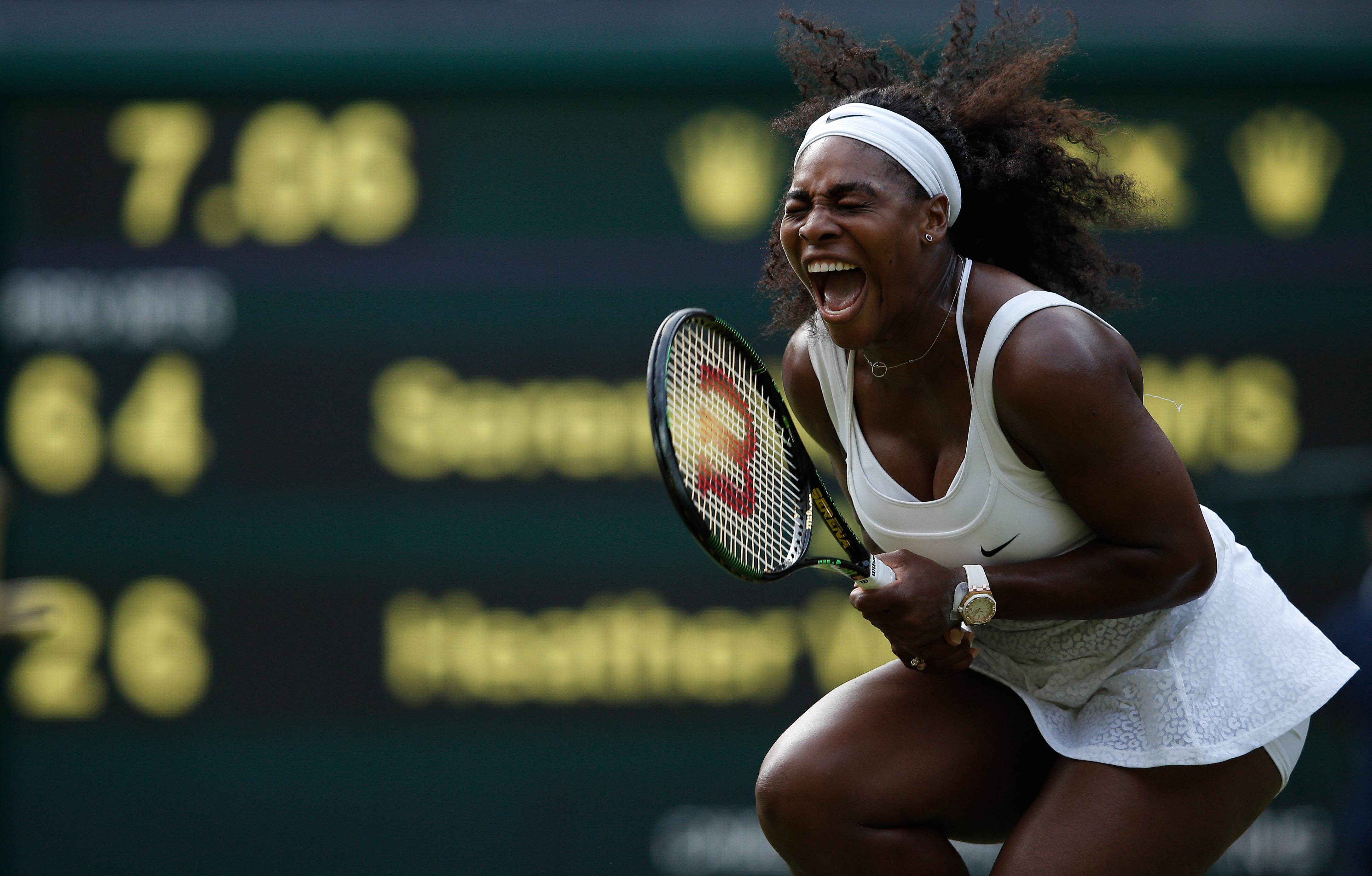 Serena Williams screams in delight after winning a point against Britain's Heather Watson during their third-round match at Wimbledon. Photo: AFP