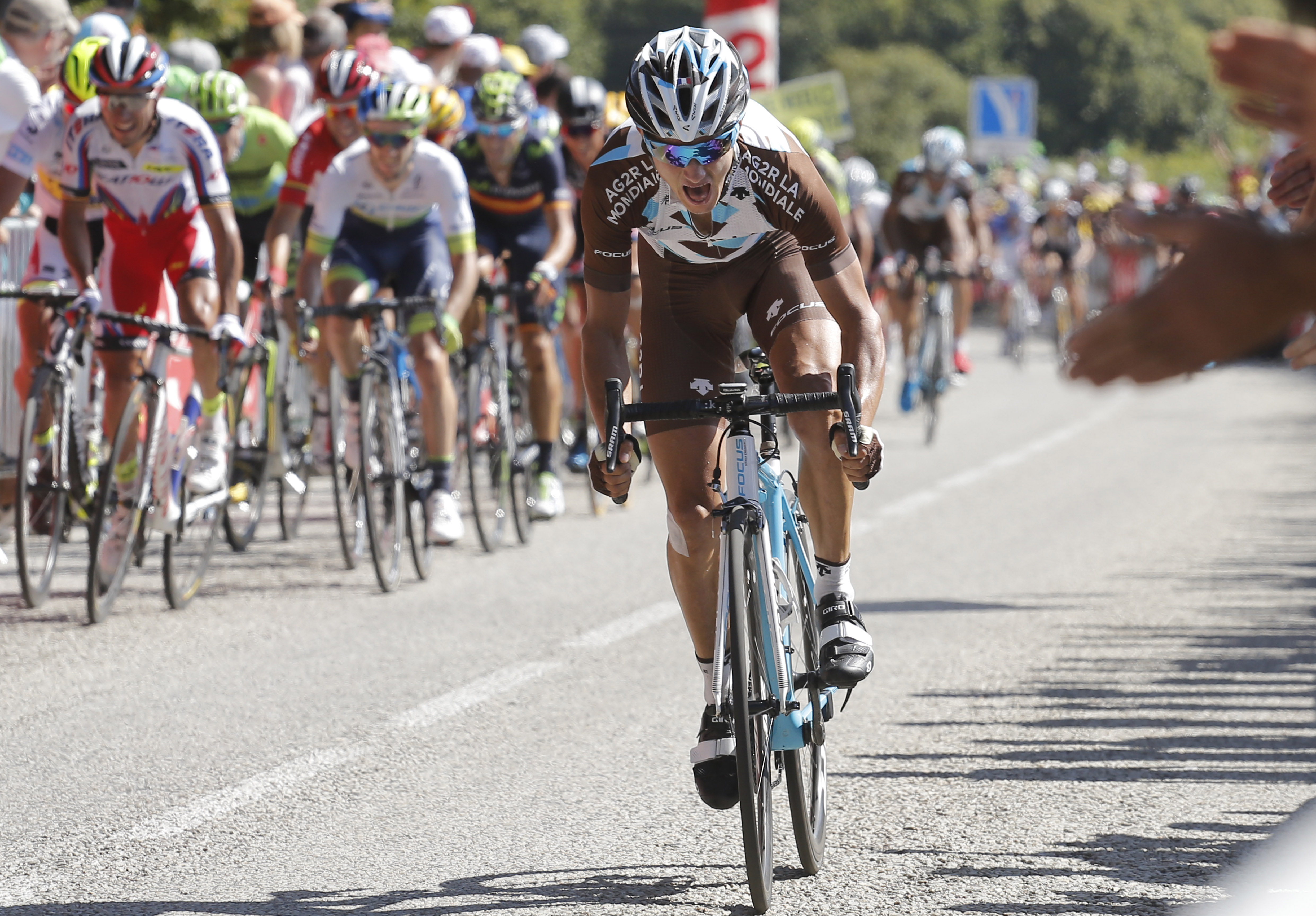 Frenchman Alexis Vuillermoz sprints to the finish at the end of the eighth stage. Photo: AP 