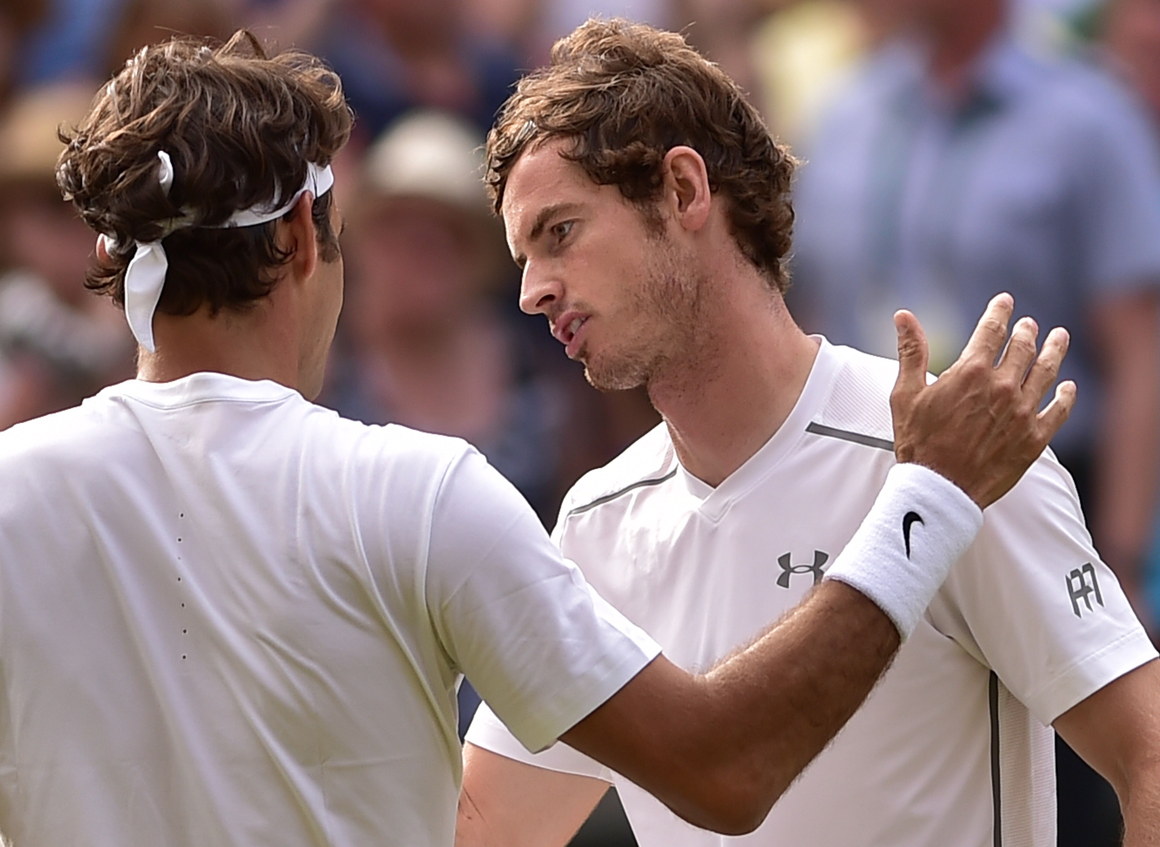 Andy Murray congratulates Roger Federer. Photo: AFP