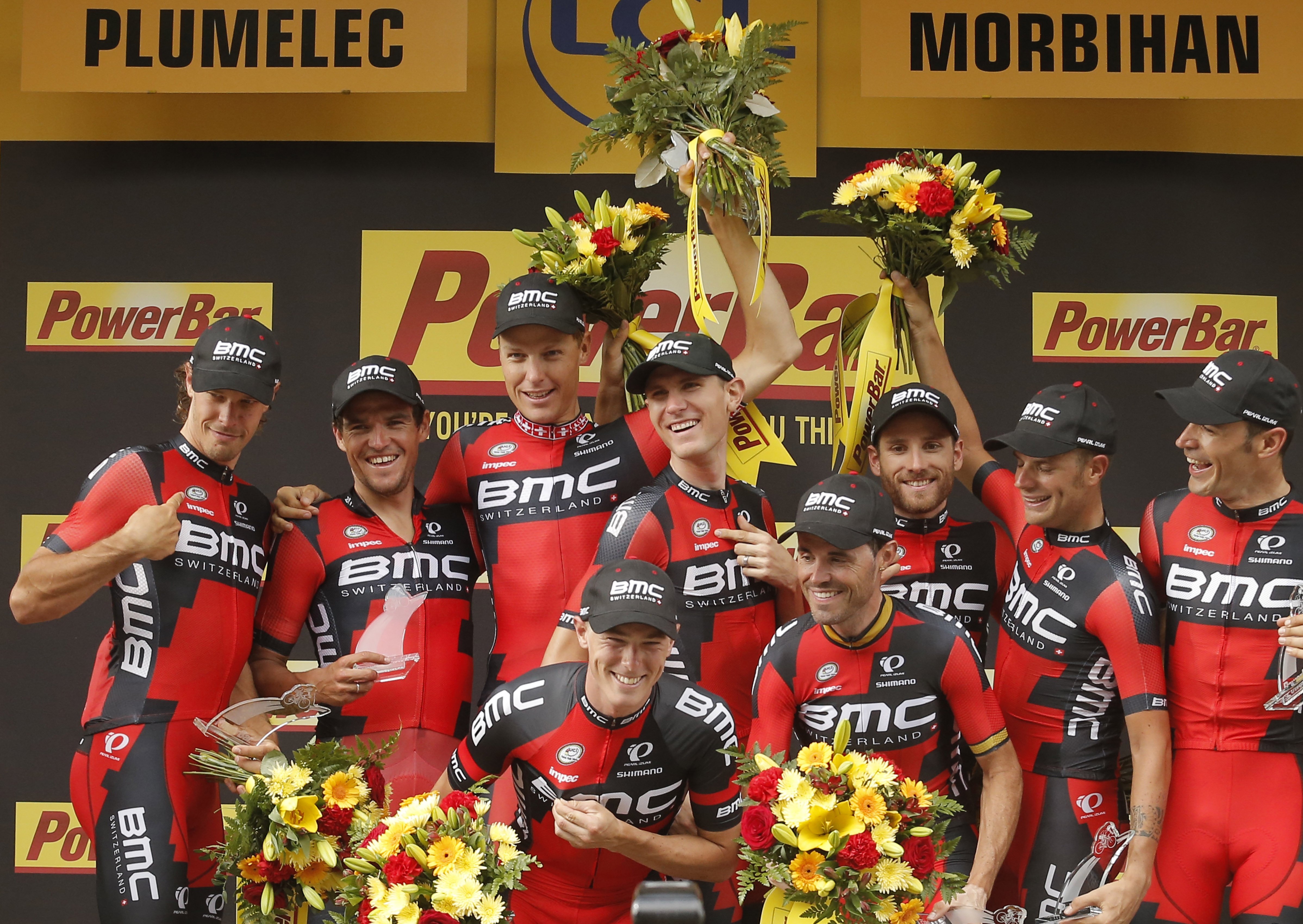 Tejay van Garderen (centre) and BMC Racing Team celebrate winning the ninth stage of the Tour de France, a 28-kilometre team time trial from Vannes to Plumelec. Photos: AP