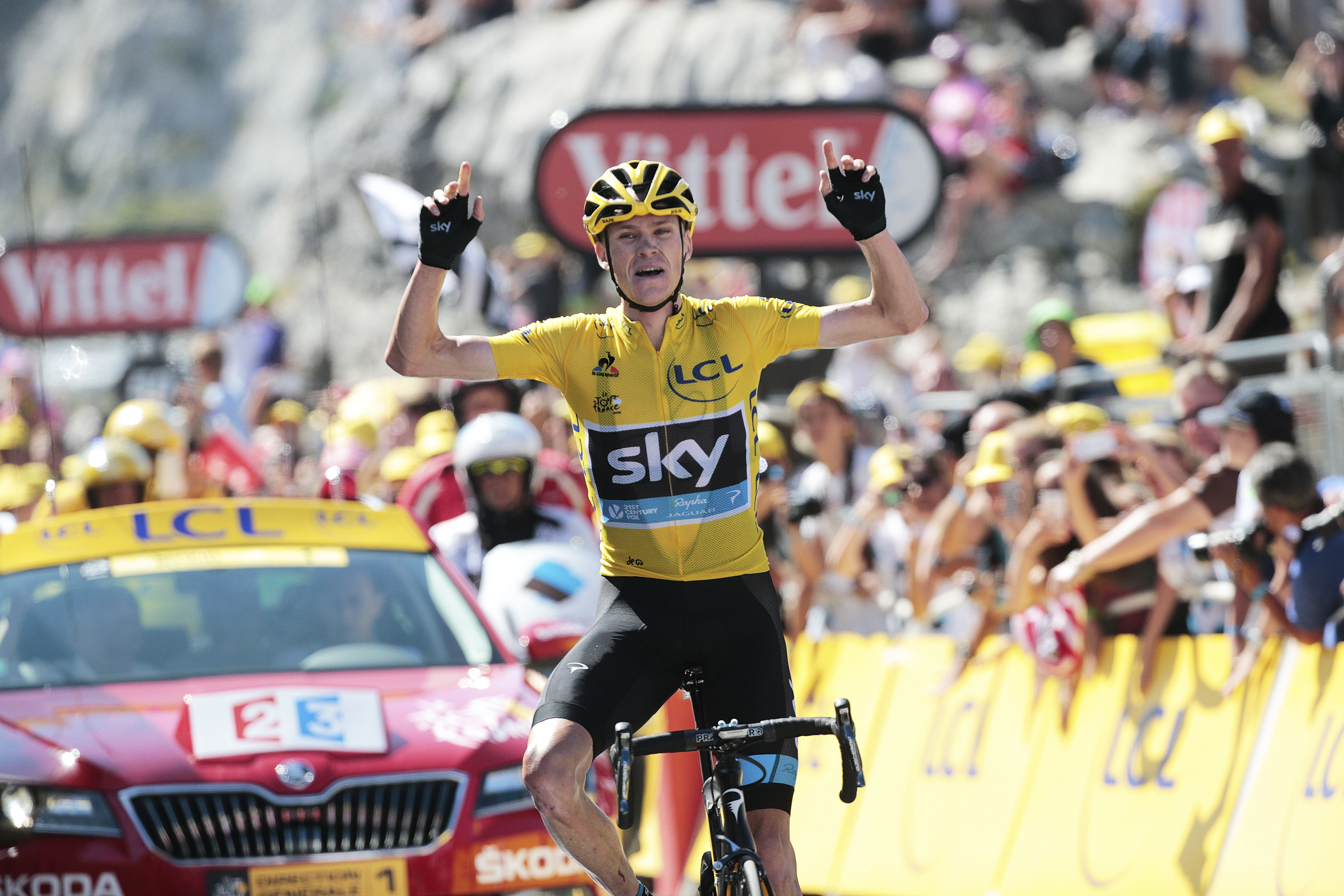 Chris Froome storms clear, after crushing the field on the first tough mountain challenge, to win the 10th stage of the Tour de France. Photo: AP