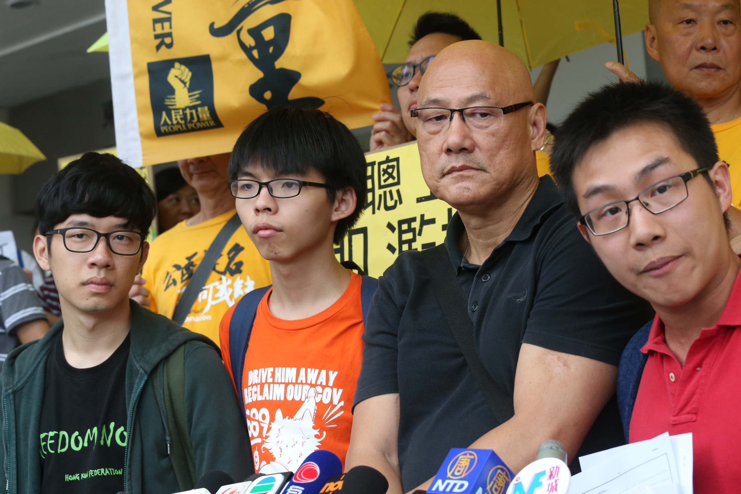 Nathan Law, Joshua Wong, Albert Chan and Raphael Wong face charges of obstructing police officers in execution of their duties. Photo: David Wong