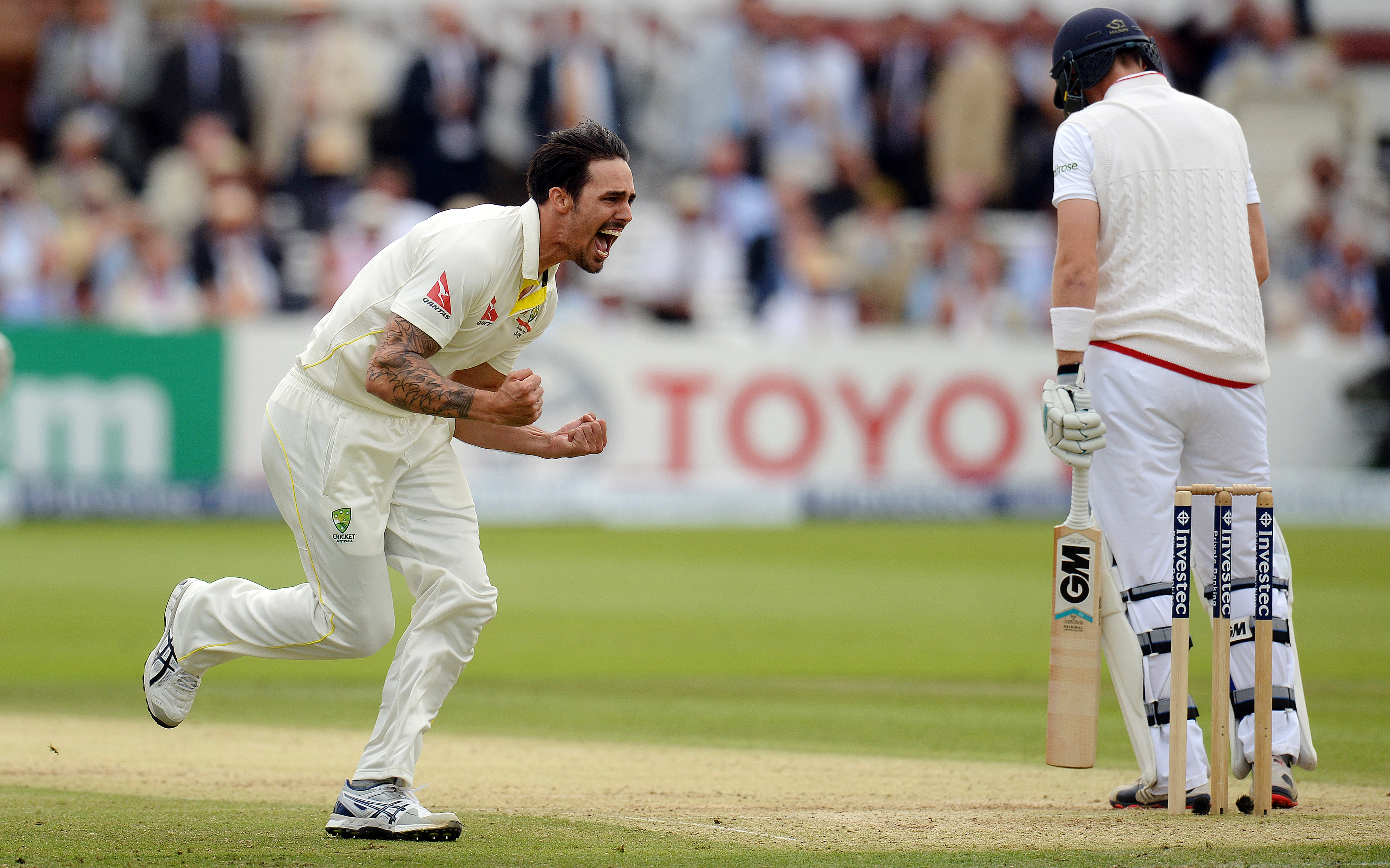 Australia's Mitchell Johnson celebrates after dismissing England's Joe Root for one run. Photo: Reuters