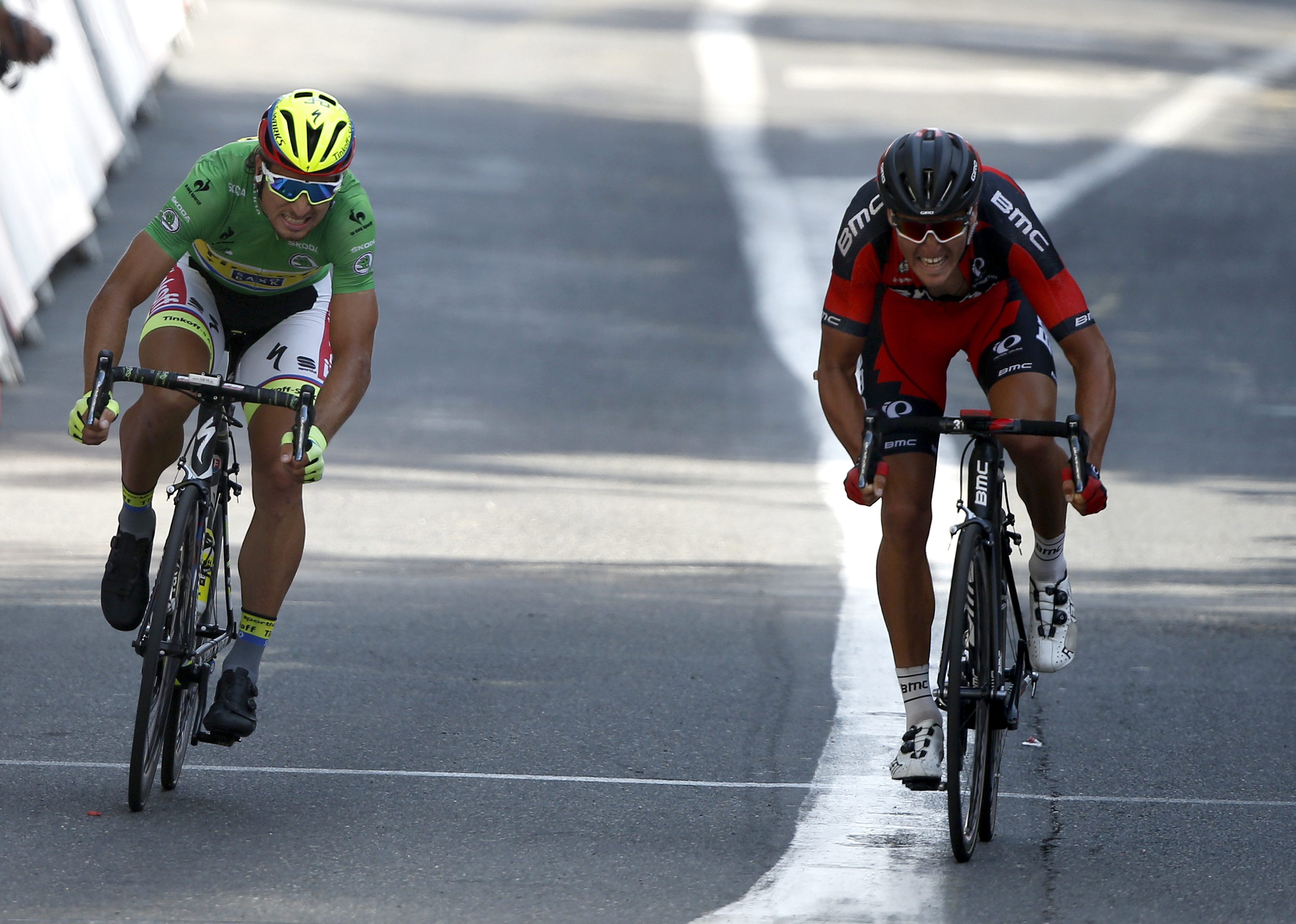 Greg Van Avermaet of Belgium sprints to win ahead of Slovak rider Peter Sagan to claim stage 13 of the Tour de France. Photo: EPA