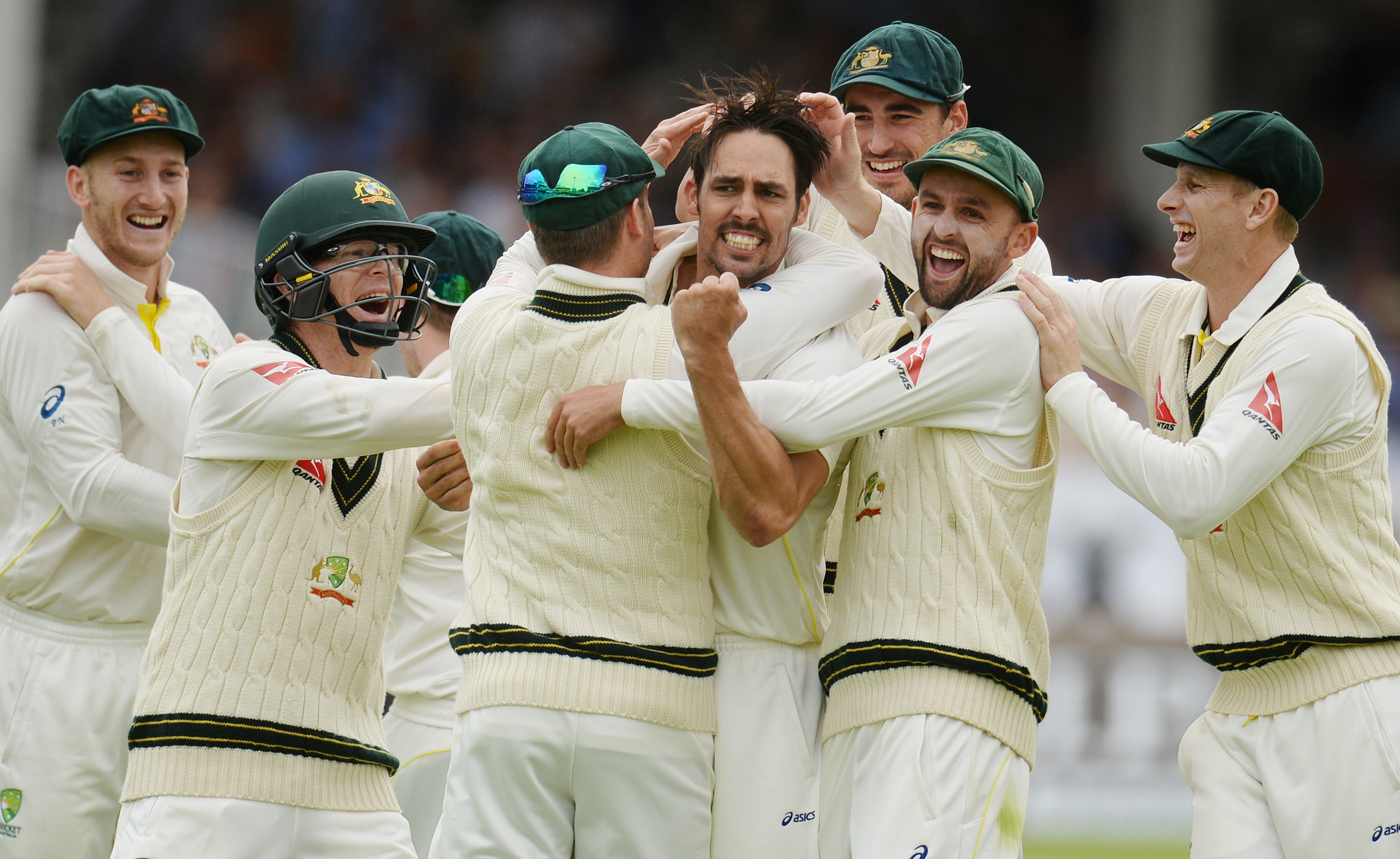 Mitchell Johnson celebrates with Australia teammates during the second test. Photo: Reuters