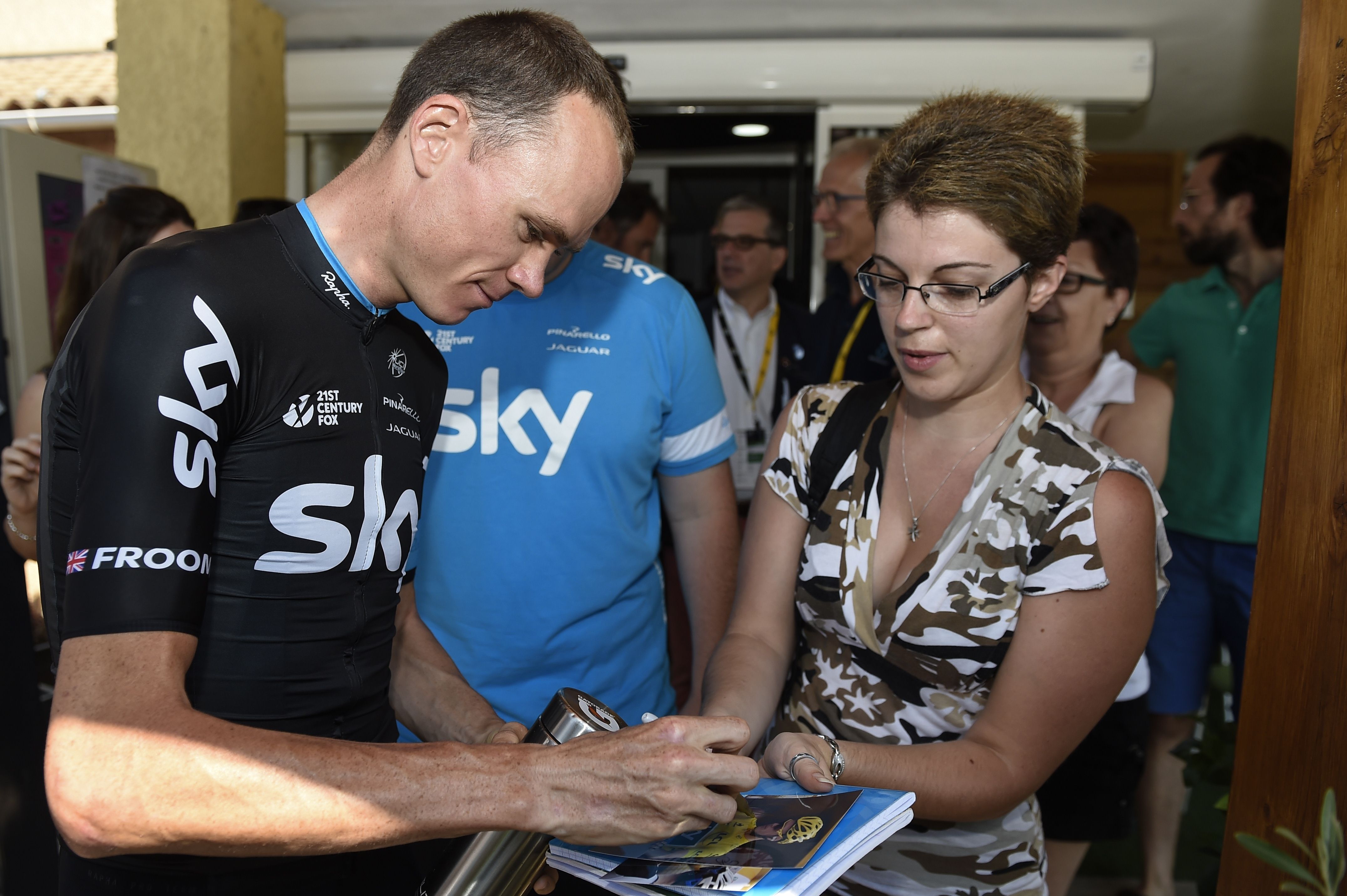 Chris Froome signs an autograph at his hotel. Photo: AFP