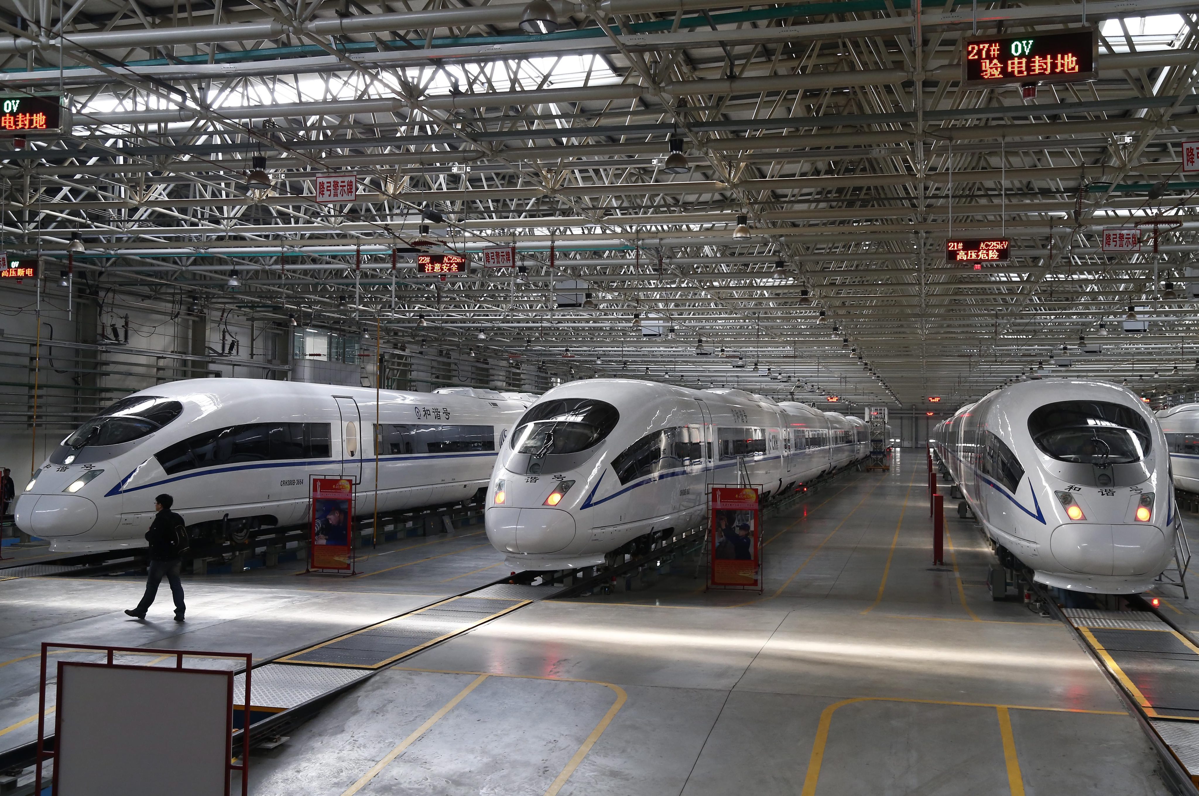 China is rapidly expanding its rail links across the country, with bullet trains more than halving journey times between key cities like Beijing and Shanghai. Photo: EPA