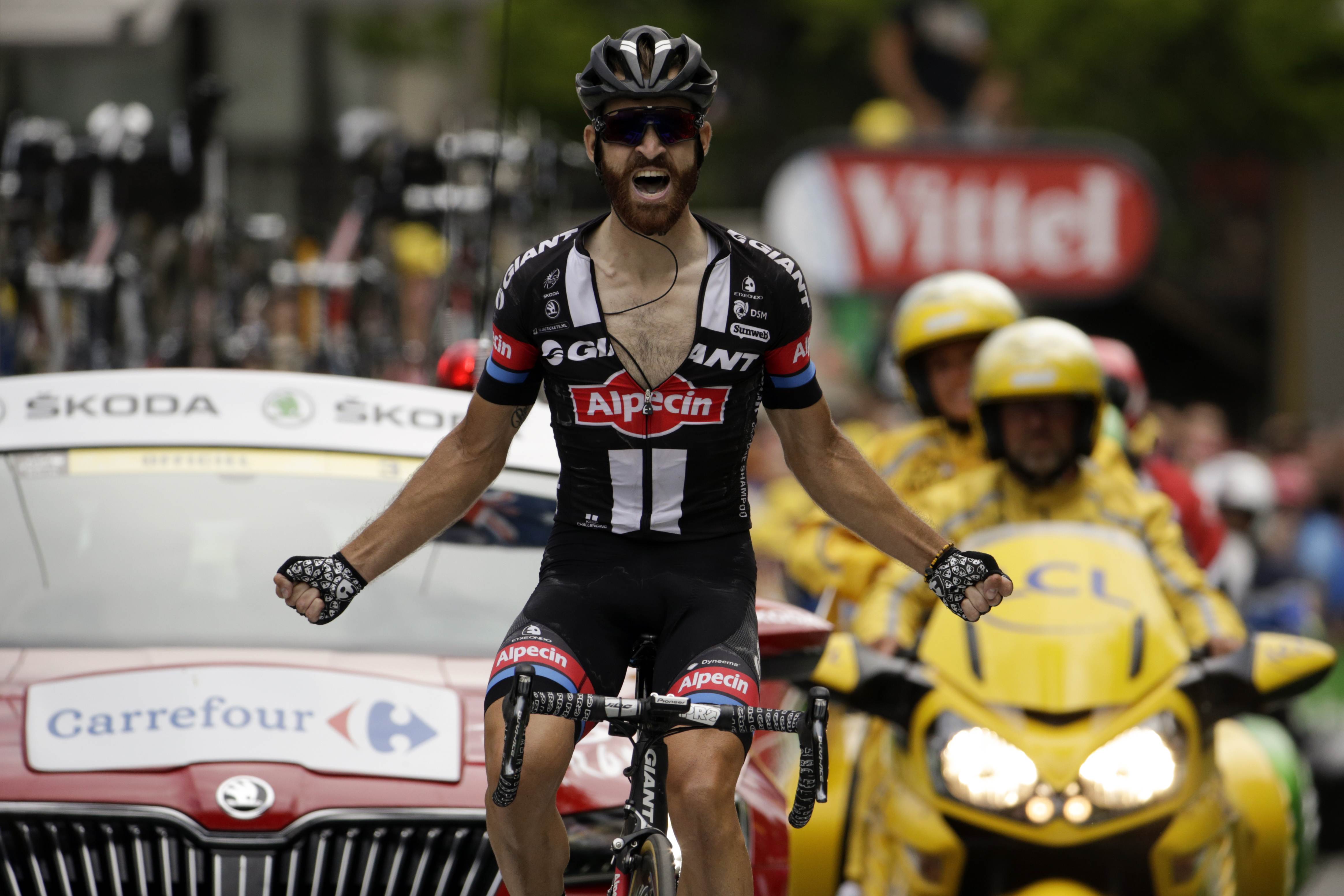 Germany's Simon Geschke celebrates the biggest win of his career as he takes stage 17. Photo: AFP
