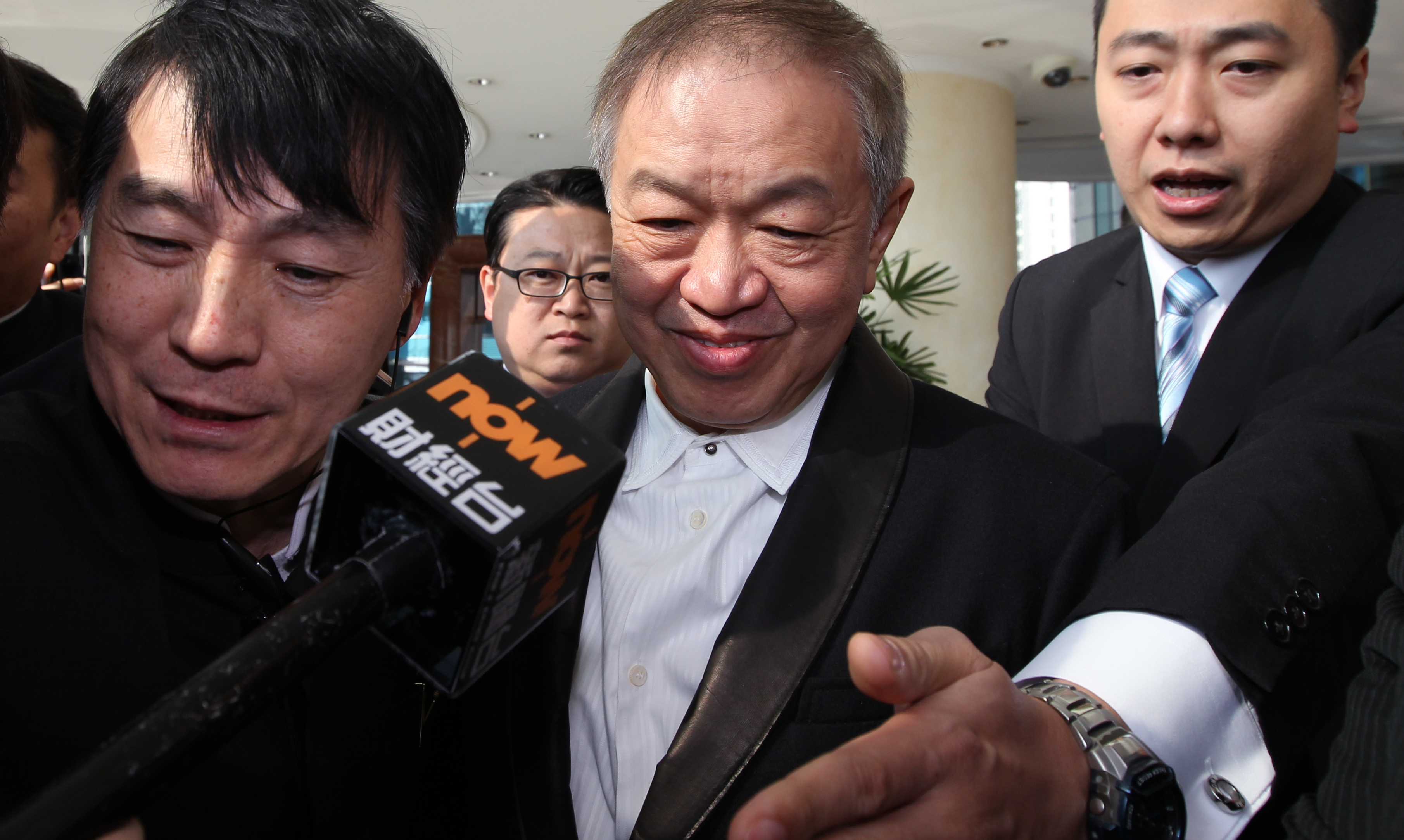 Power Assets chairman Canning Fok (centre) says the group's cash position is strong. Photo: Nora Tam