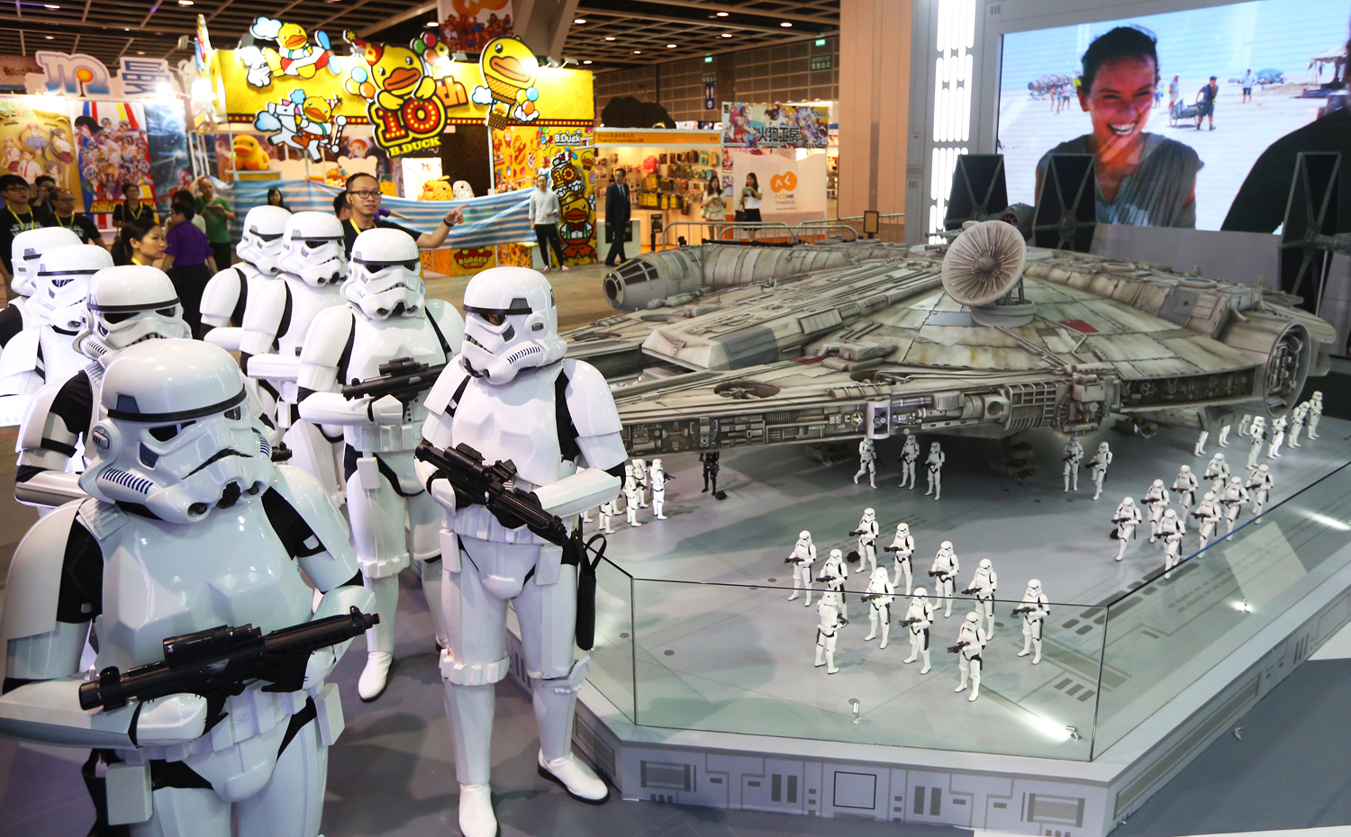 Storm troopers stand guard at a massive, 1:6 scale model of the iconic Star Wars ship, the Millennium Falcon, which appears in the upcoming seventh installment of the series: The Force Awakens. Photo: Sam Tsang