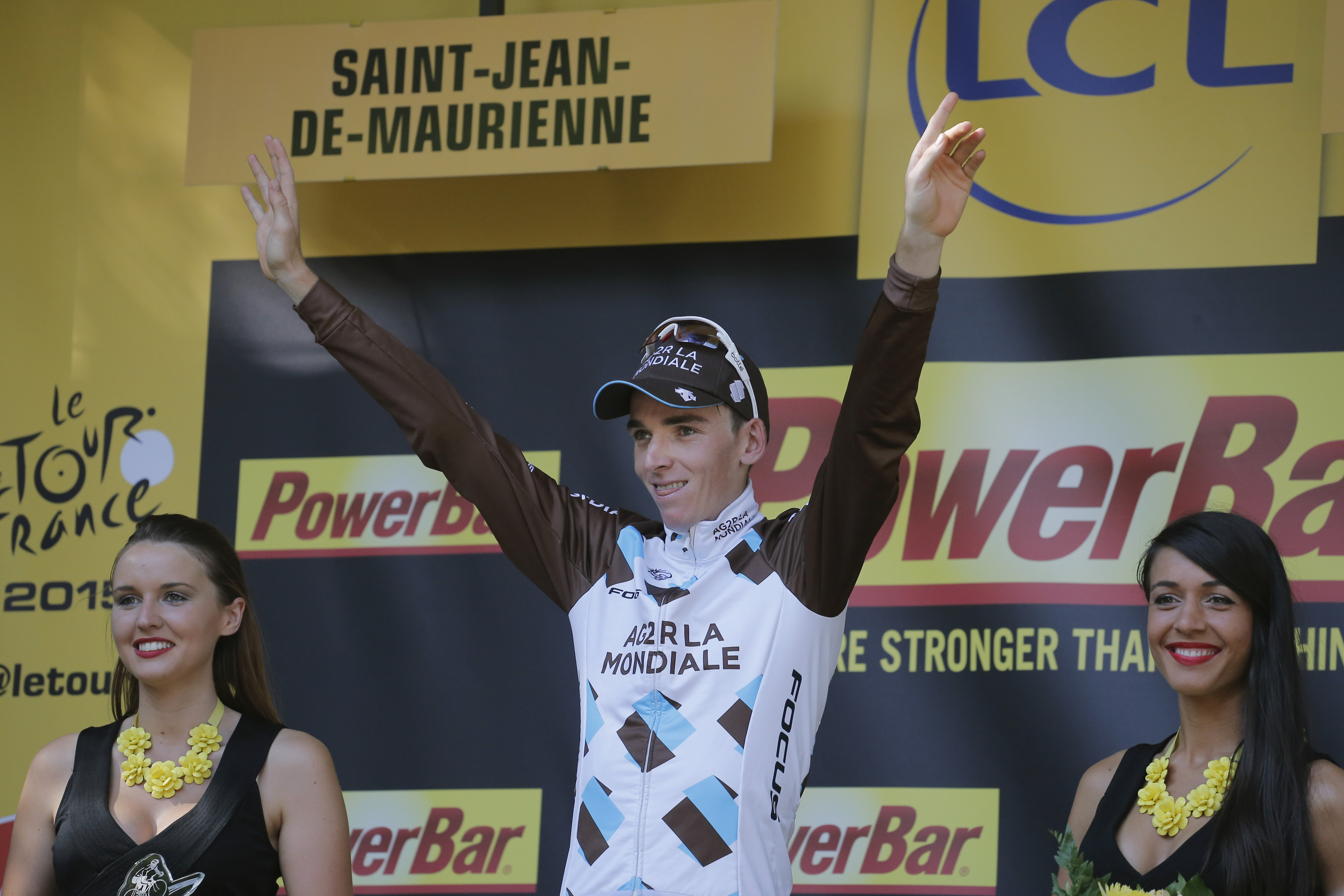 Stage winner Romain Bardet of France celebrates on the podium at the 18th stage of the Tour de France. Photo: AP