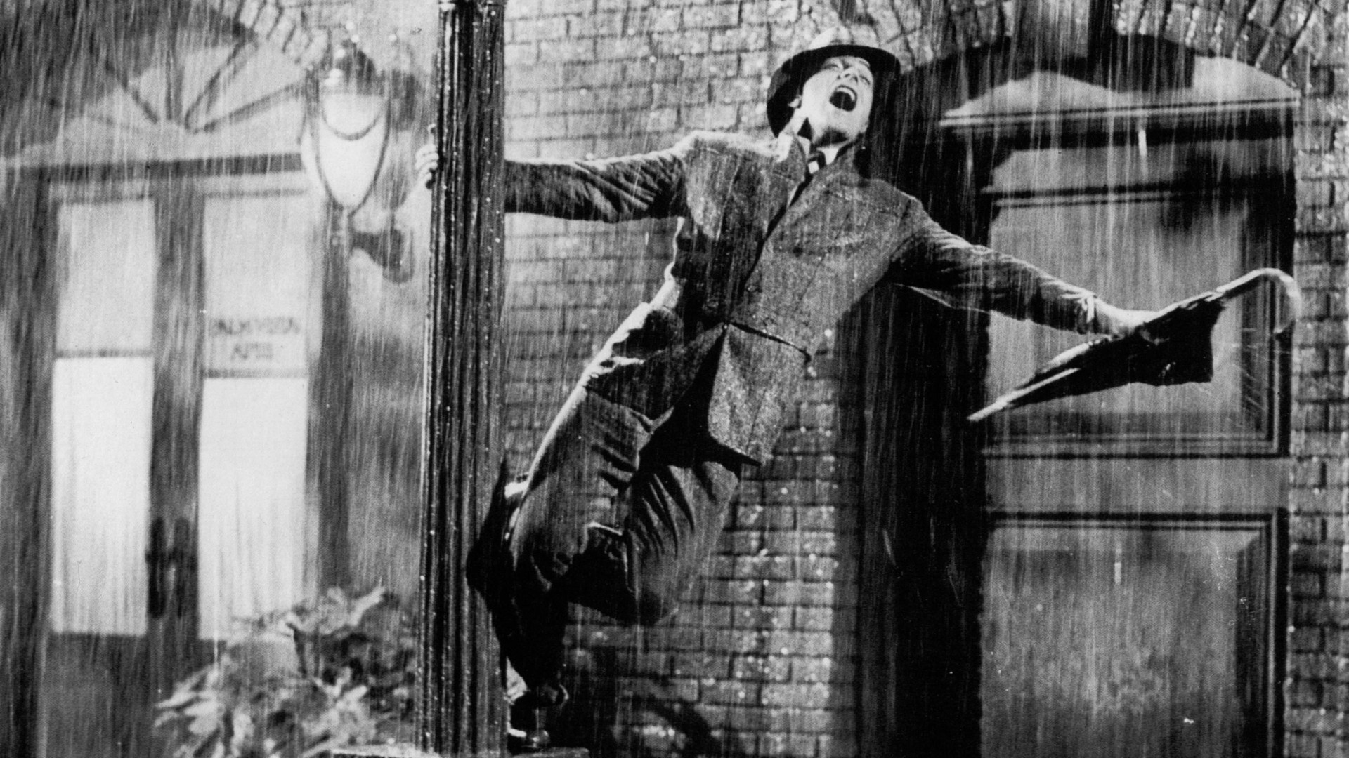 A still from the 1952 movie Singin' in the Rain, whose title song is perhaps the most famous ode to precipitation ever written.