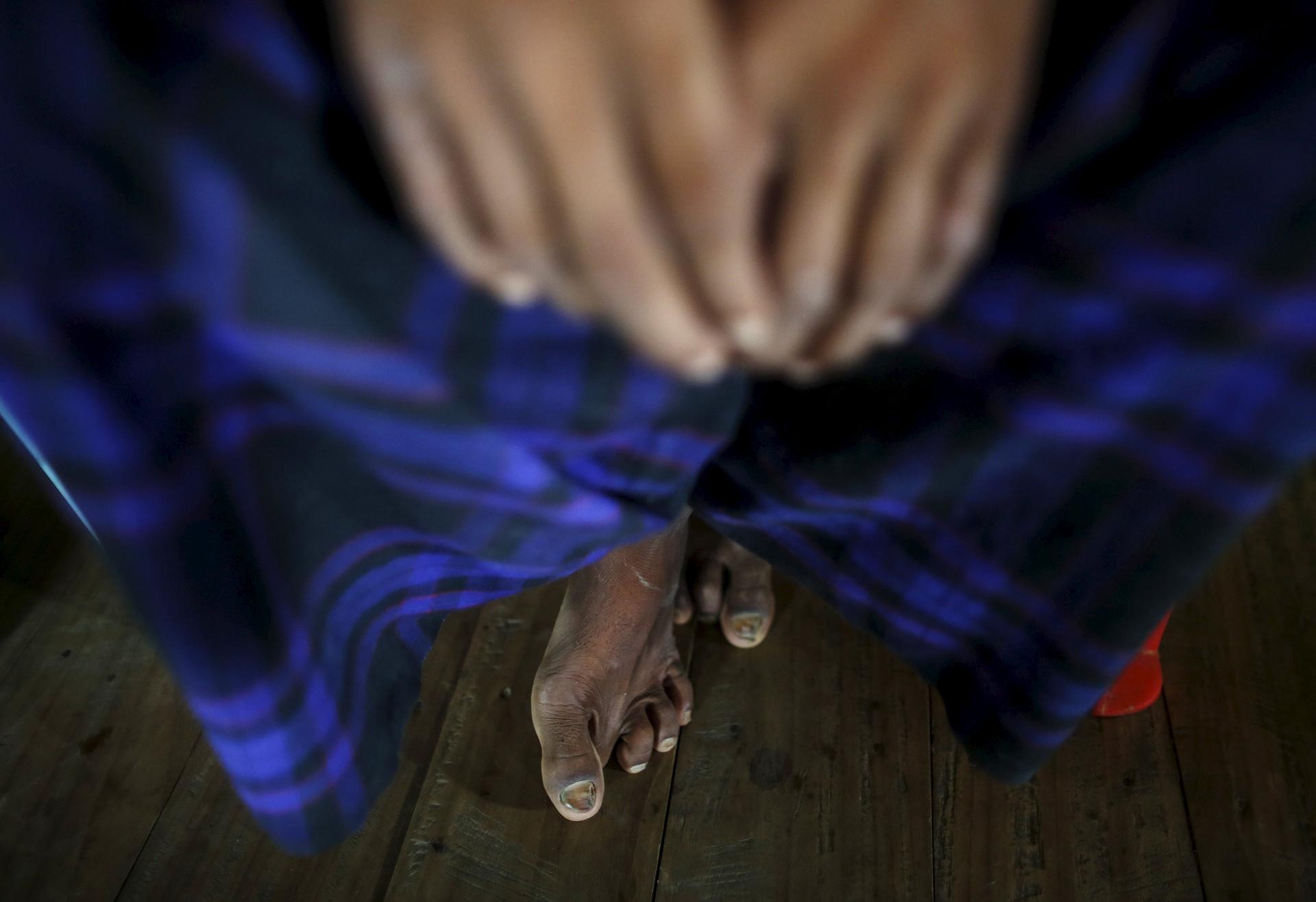 A victim of forced labour relates his story. Many care about their plight. Photo: Reuters