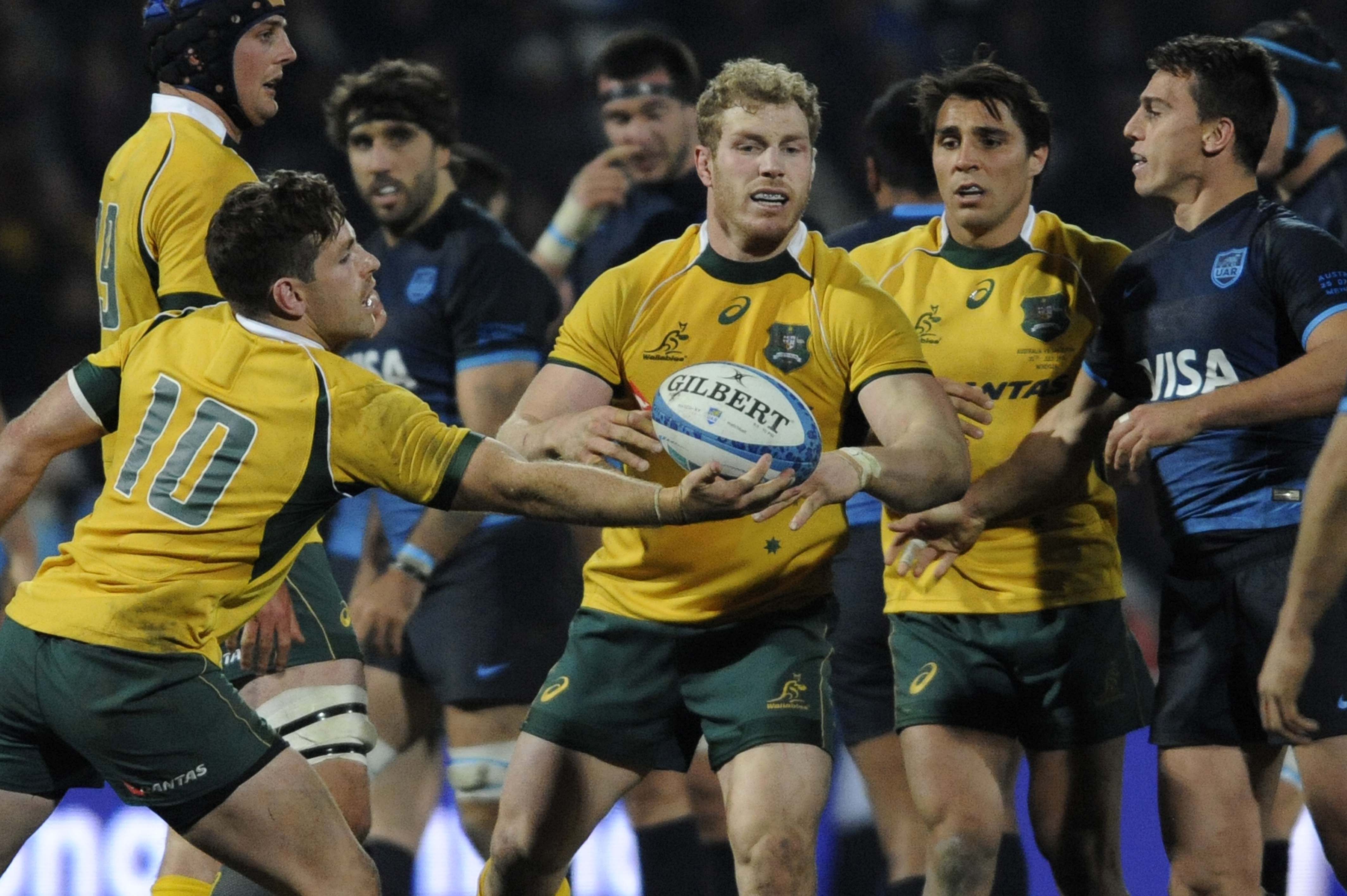 David Pocock (centre) will be at the back of the scrum for Australia on Saturday. Photos: AFP