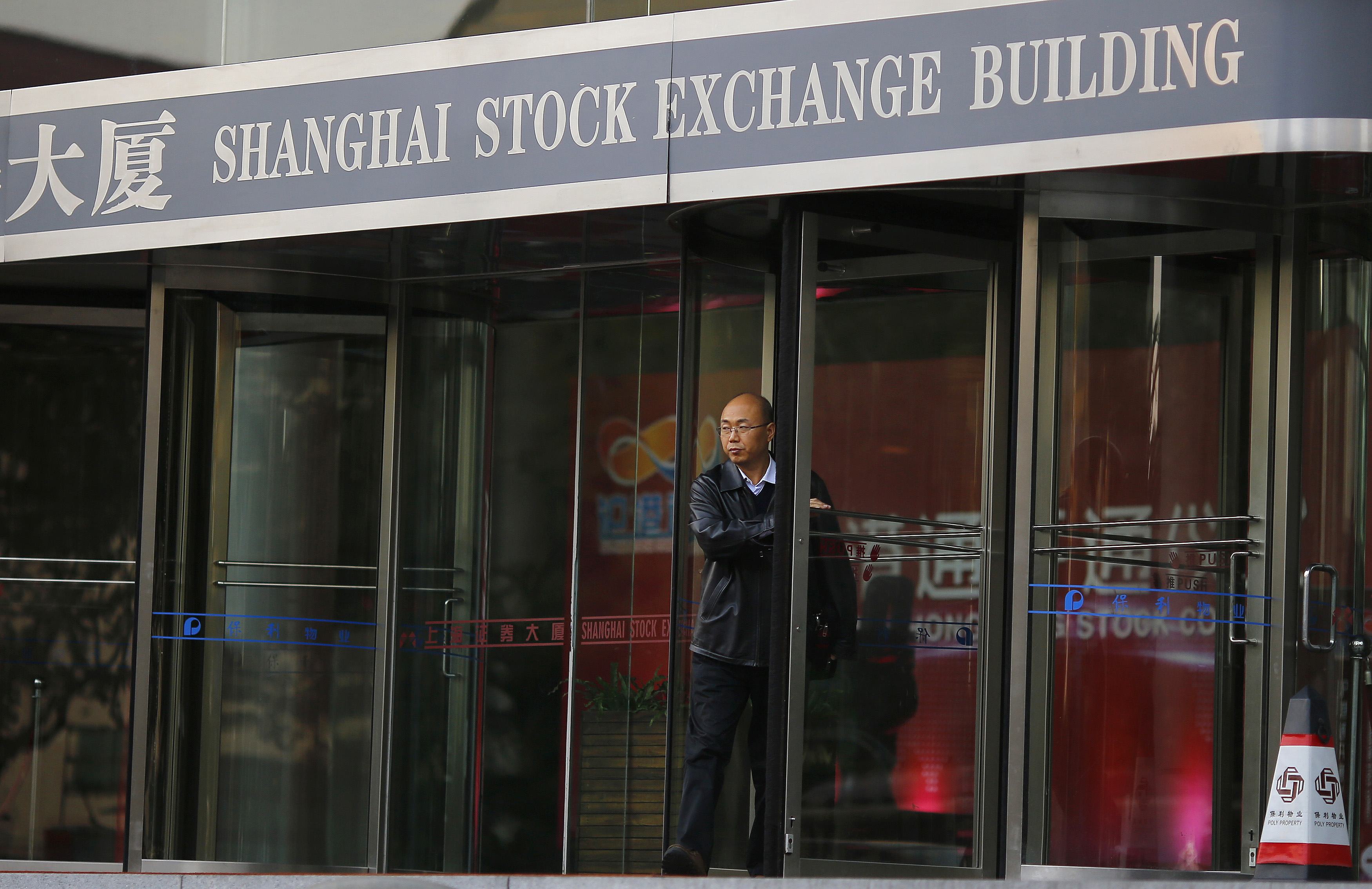 The entrance to the Shanghai Stock Exchange where loan books for margin financing have been repackaged and securitized as an asset-backed securities product. Photo: Reuters 
