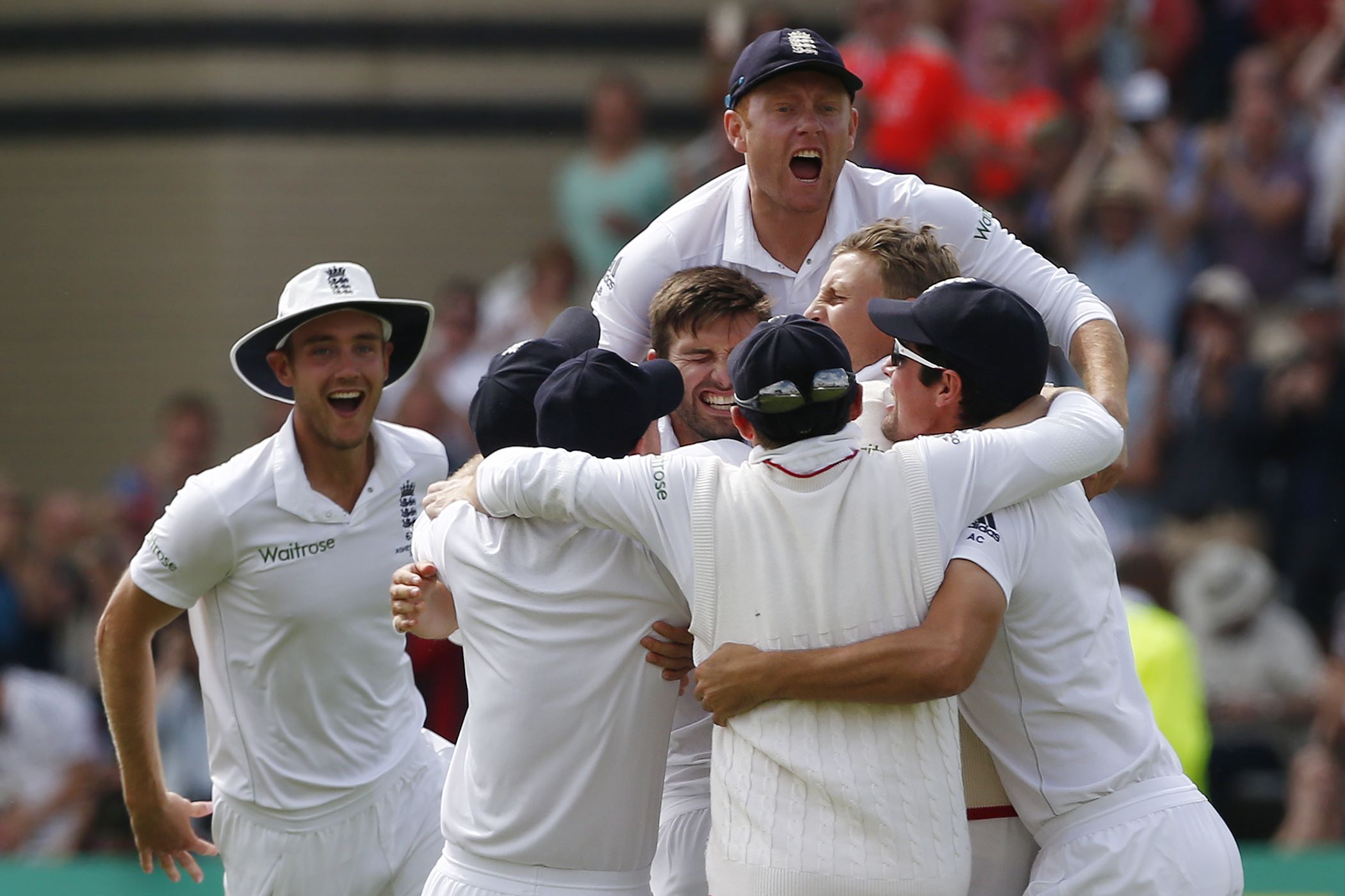 England's Ben Stokes (top) and teammates celebrate as England wrap up the fourth test and regain the Ashes at Trent Bridge in Nottingham. Photo: AFP