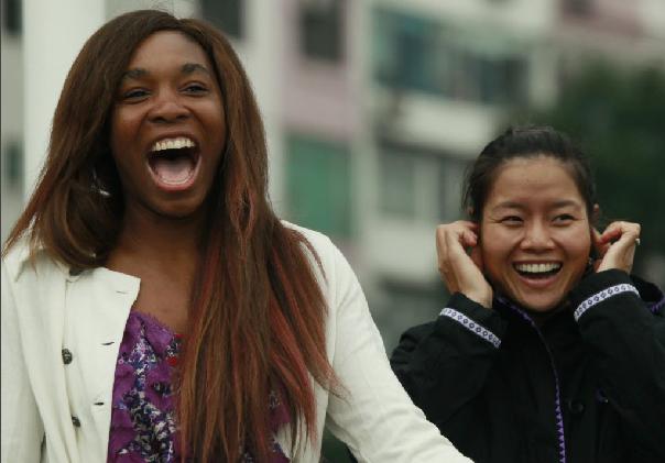 Venus Williams and China's Li Na have fun during the American's trip to Hong Kong in 2011. Photo: SCMP Pictures
