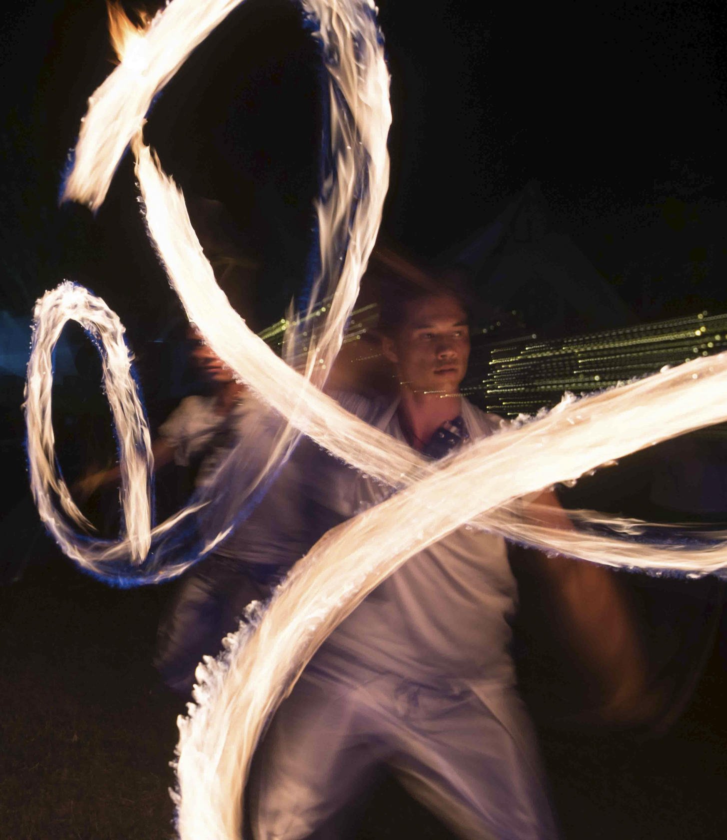 Performers get creative once the sun sets at Imagine Peace festival. Photos: Jon Butters