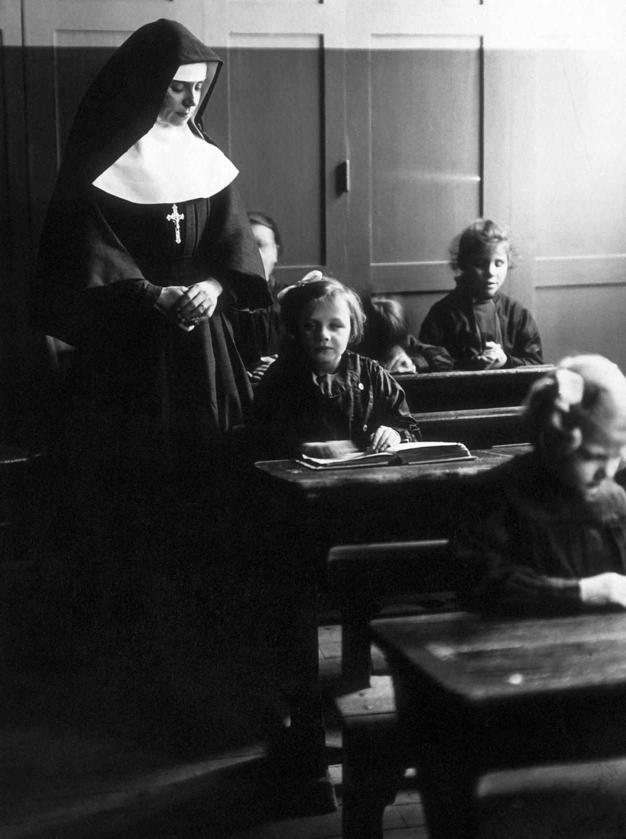 A nun takes a class in Germany in the middle of the last century.Photo: Corbis
