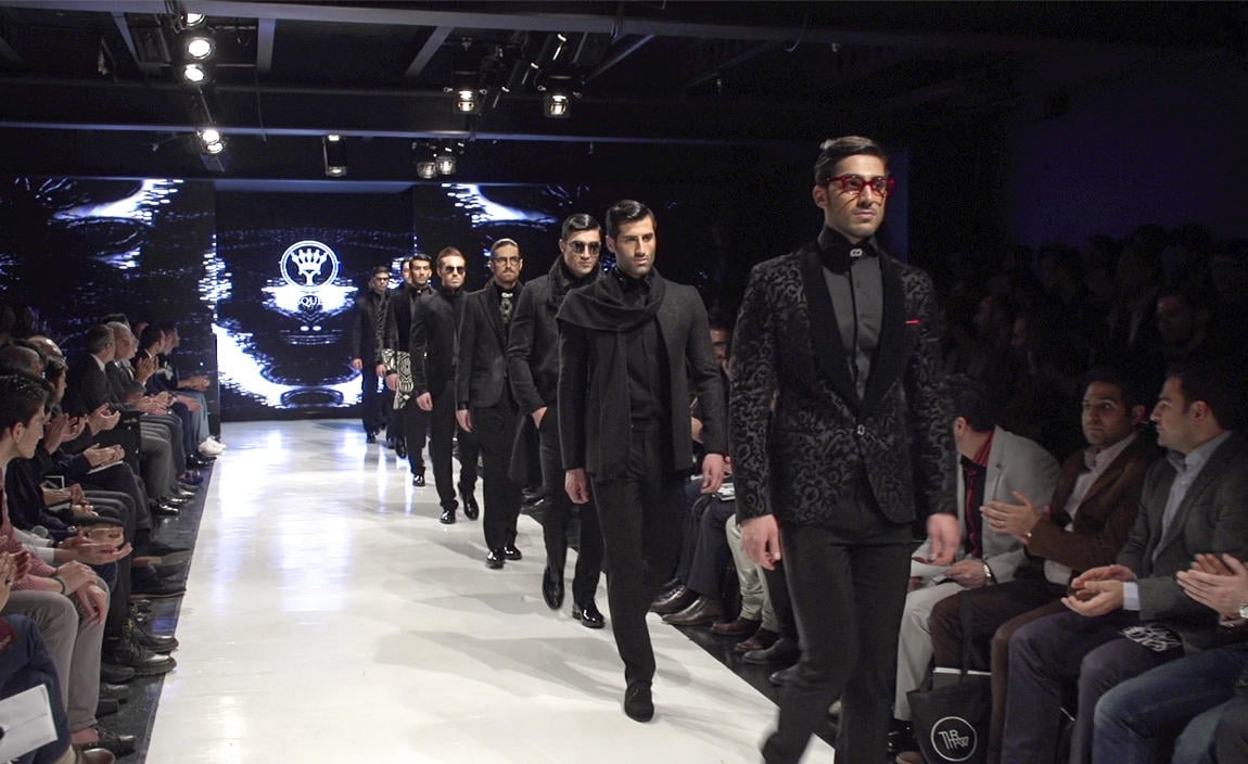 Male models on the catwalk at this year's Tehran Fashion Week.