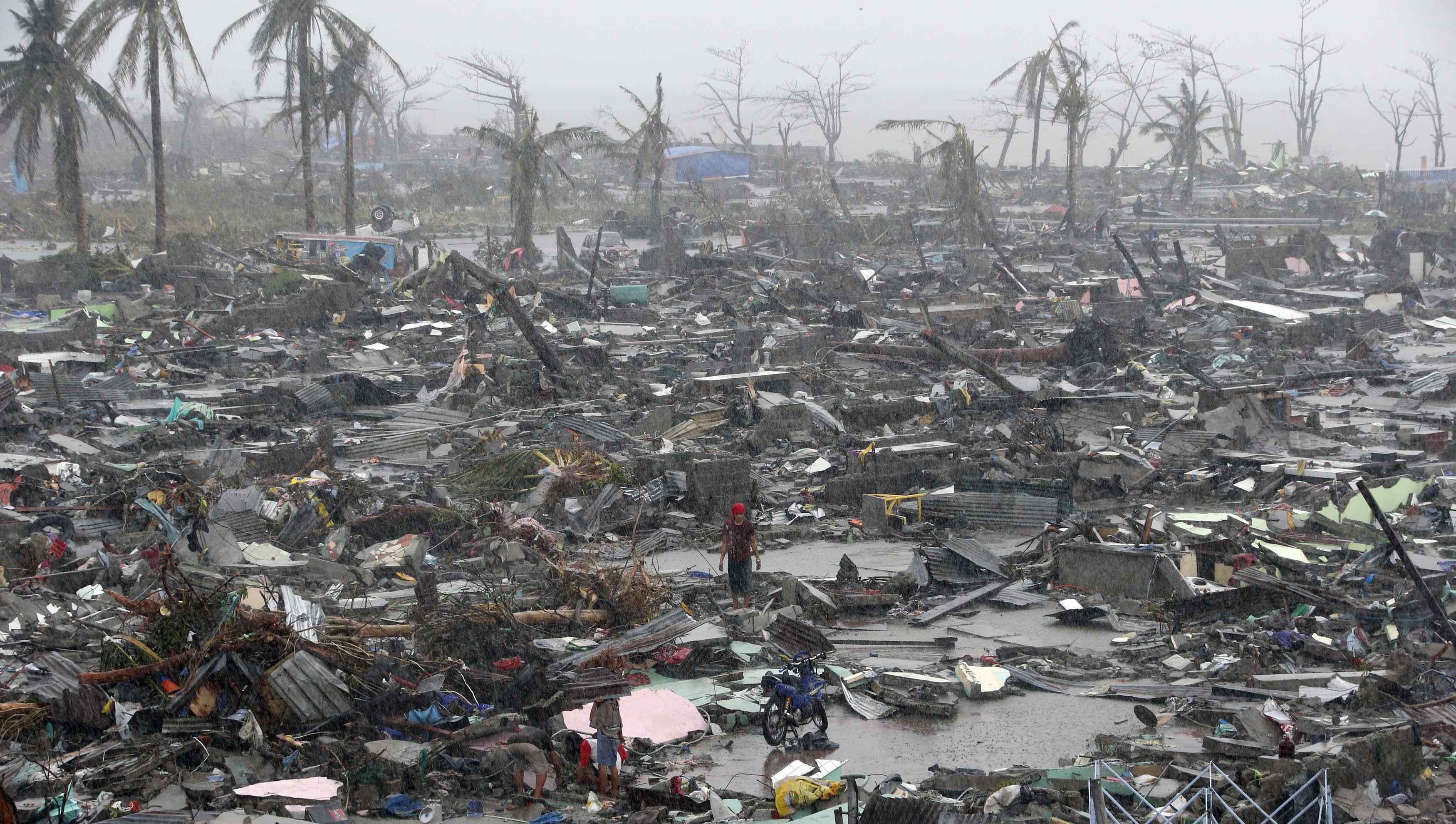 The devastation wreaked by Super Typhoon Haiyan on the city of Tacloban in the central Philippines. Scientists say storms are becoming more intense because of global warming. Photos: AFP; K.Y. Cheng; Dickson Lee; EPA; Edward Wong