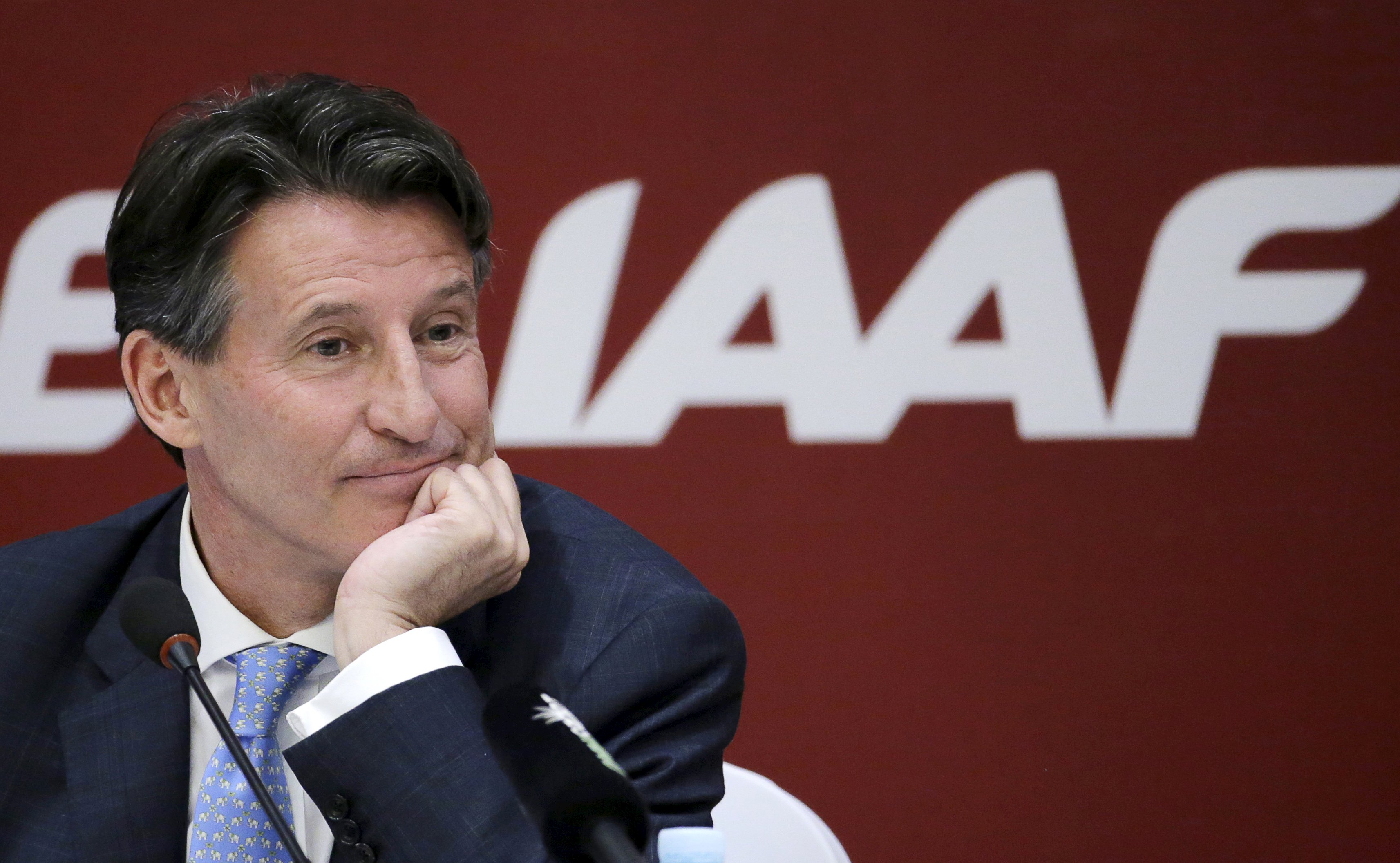 Newly elected president of the International Association of Athletics Federations, Sebastian Coe, listens to a question at a news conference in Beijing. Photo: Reuters 