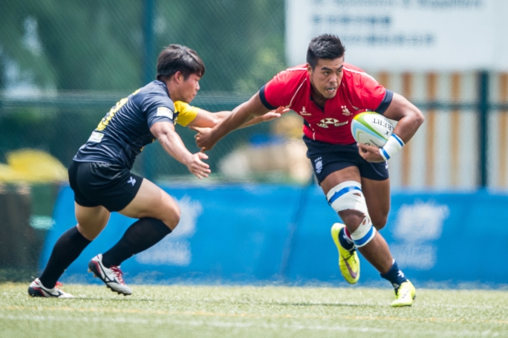Hong Kong captain Richard Lewis leads from the front on the first day of the second leg of the 2015 Asia Rugby U20 Sevens Series at King's Park on Friday. Photo: HKRU