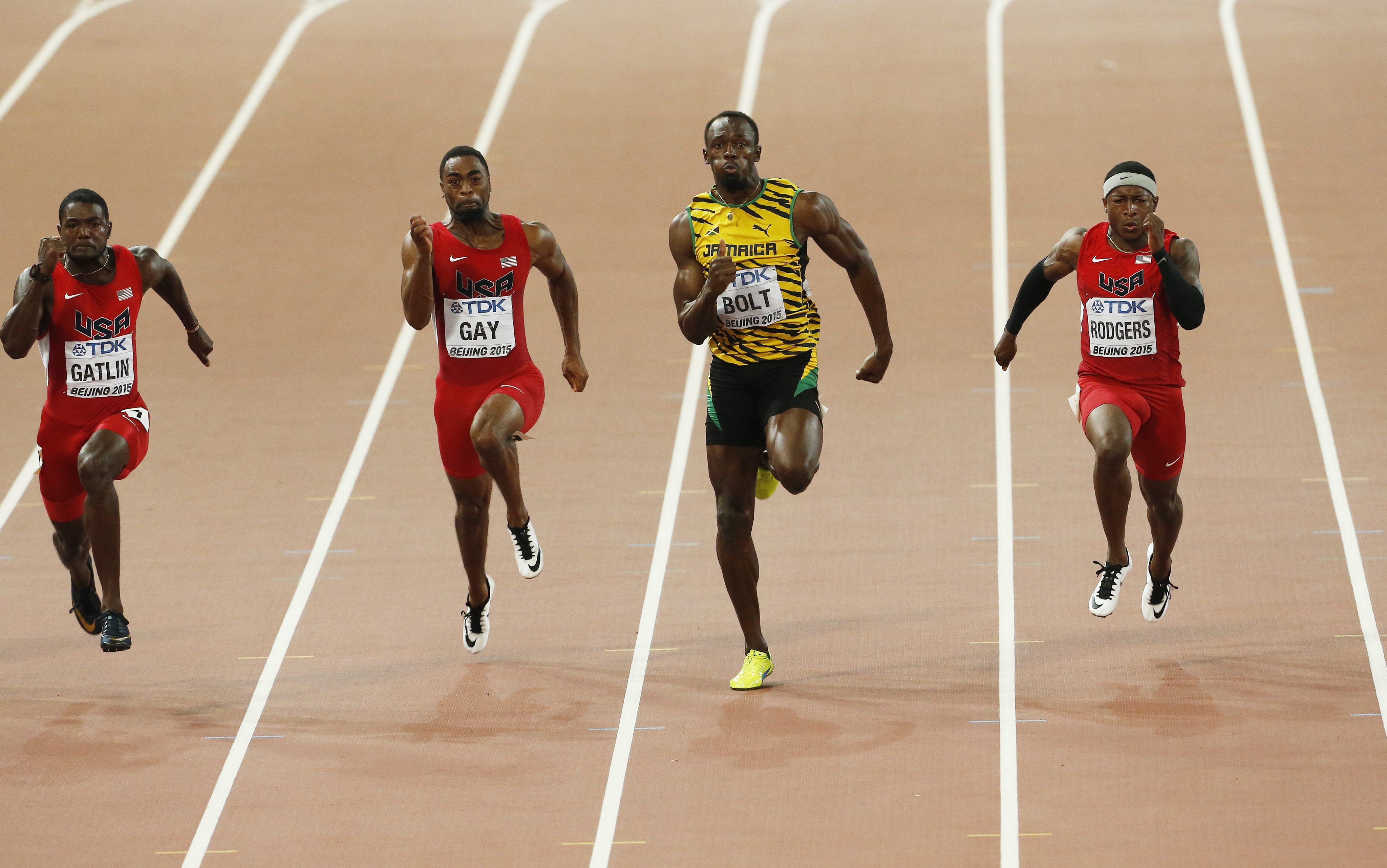 Jamaica's Usain Bolt on his way to winning the gold medal, ahead of arch rival Justin Gatlin (left) in the men's 100m final at the World Athletics Championships in Beijing. Photo: EPA