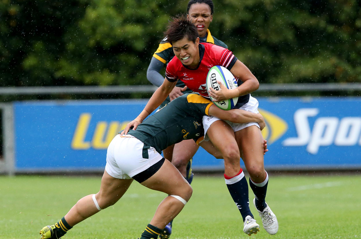 Aggie Poon Pak-yan – scorer of eight Hong Kong tries at the World Rugby Women’s Sevens Series qualifiers in Dublin at the weekend – runs into the South African defence. Photos: World Rugby