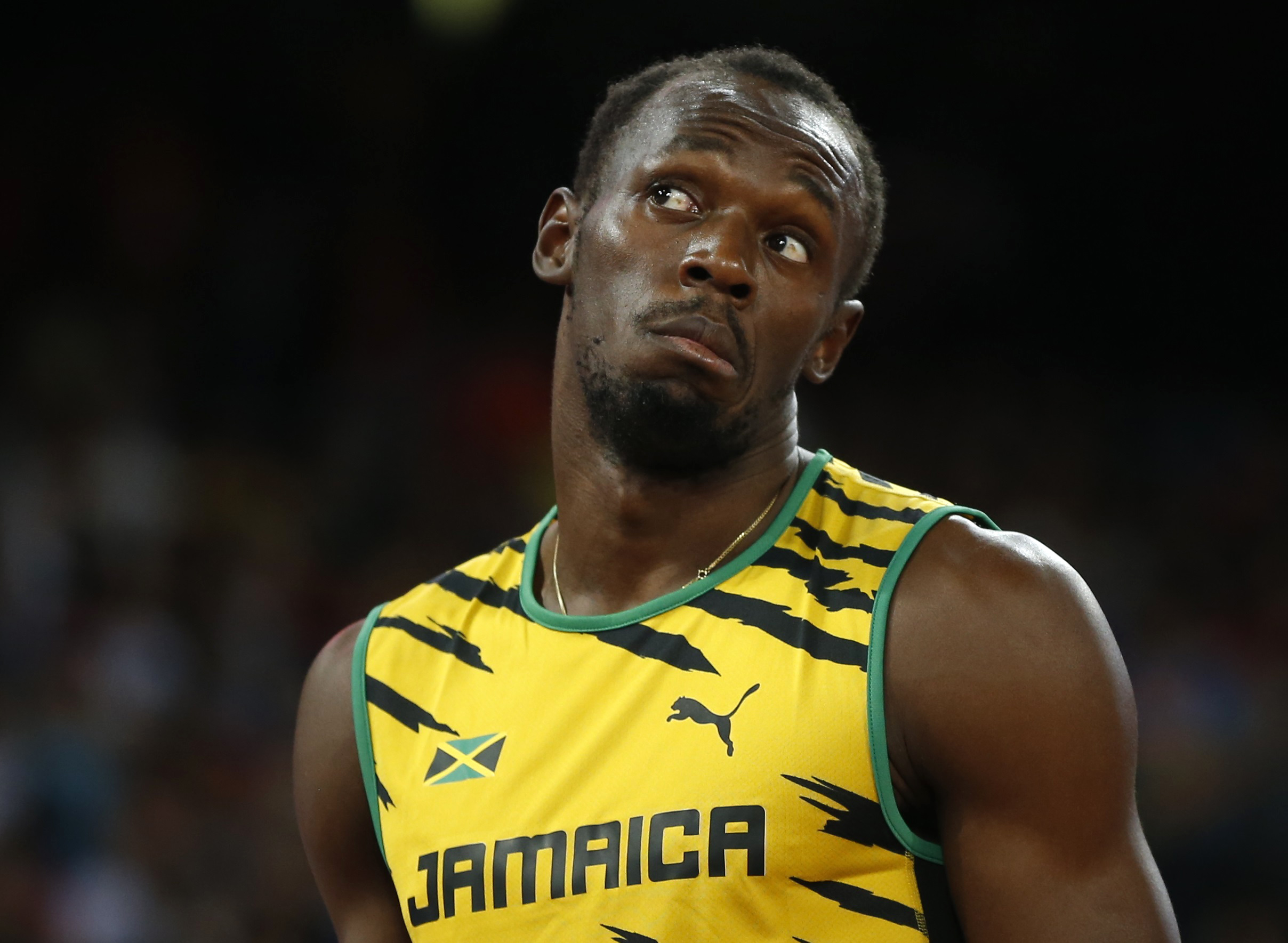 Presure? What pressure? Usain Bolt in a confident mood on the track for the men's 200m heats at the world athletics championships in Beijing. Photo: Reuters