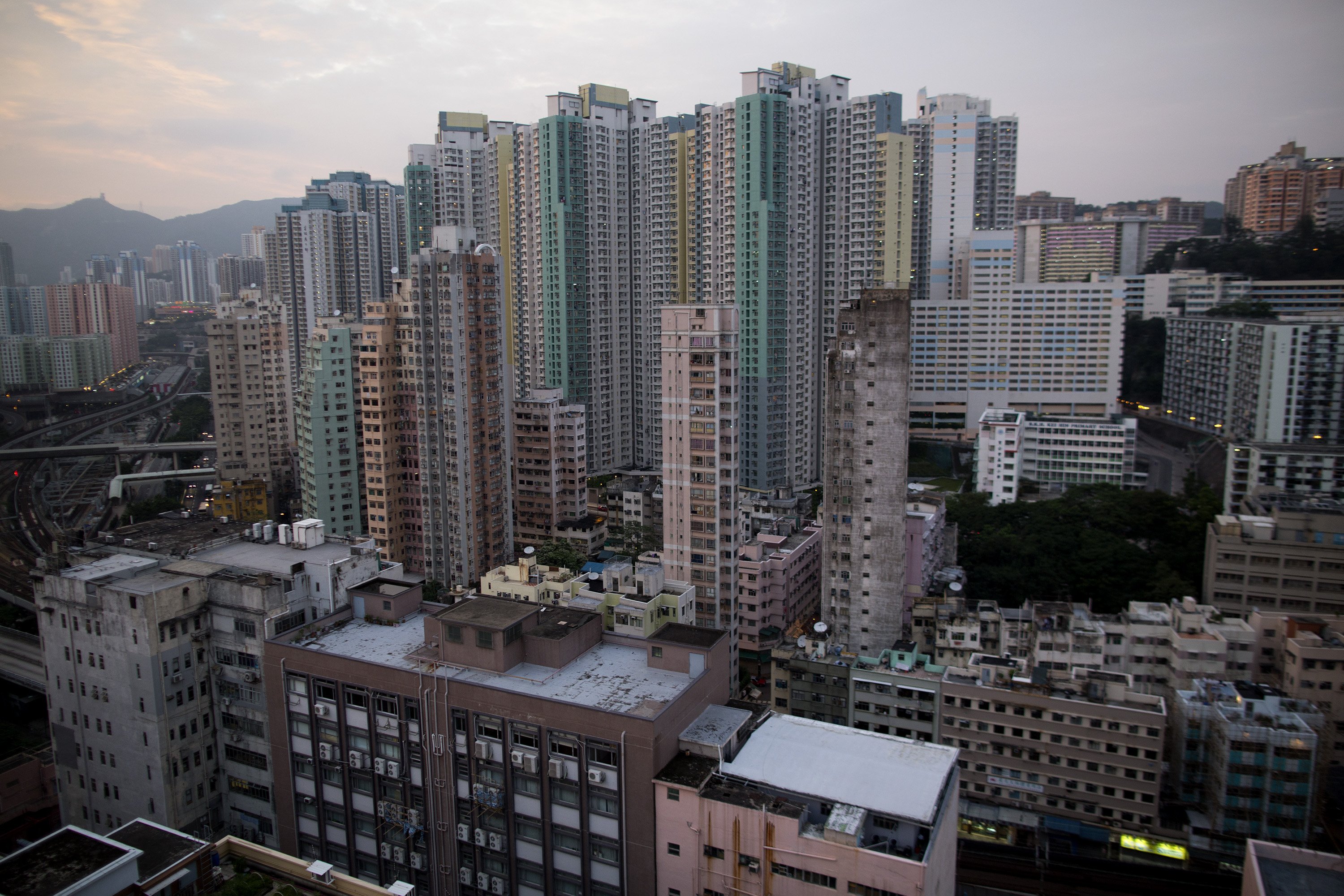Residential and industrial buildings stand in Hong Kong's Kowloon East. Photo: Bloomberg