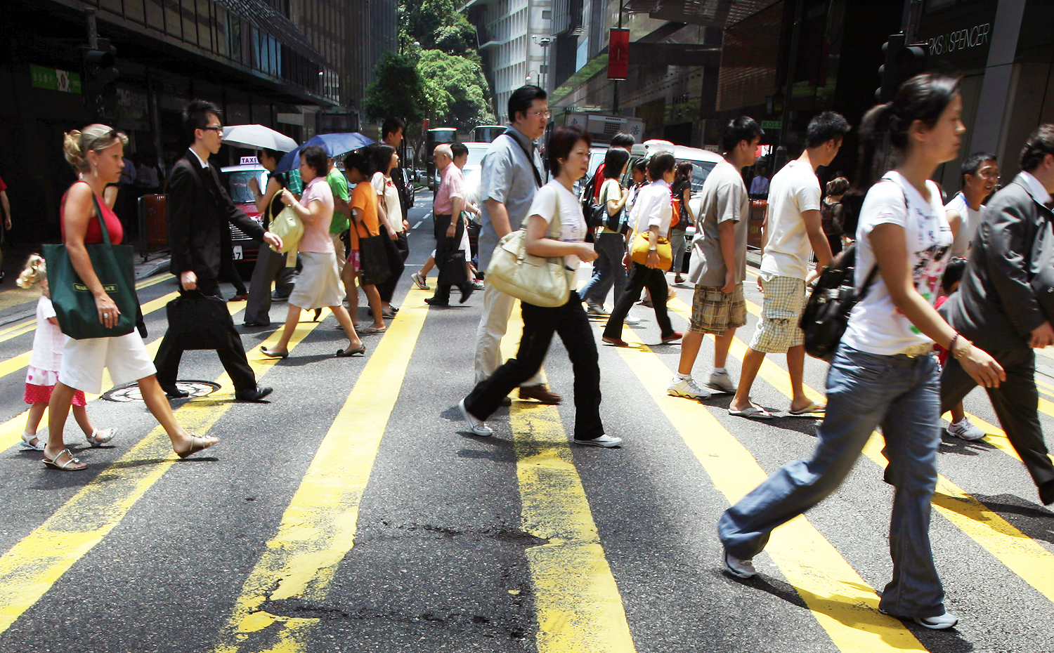 More than six in 10 employees in Hong Kong polled said they are unhappy at work and almost half of them said they intended to change jobs in the next 12 months, according to a survey carried out by a job-seeking website. Photo: AFP