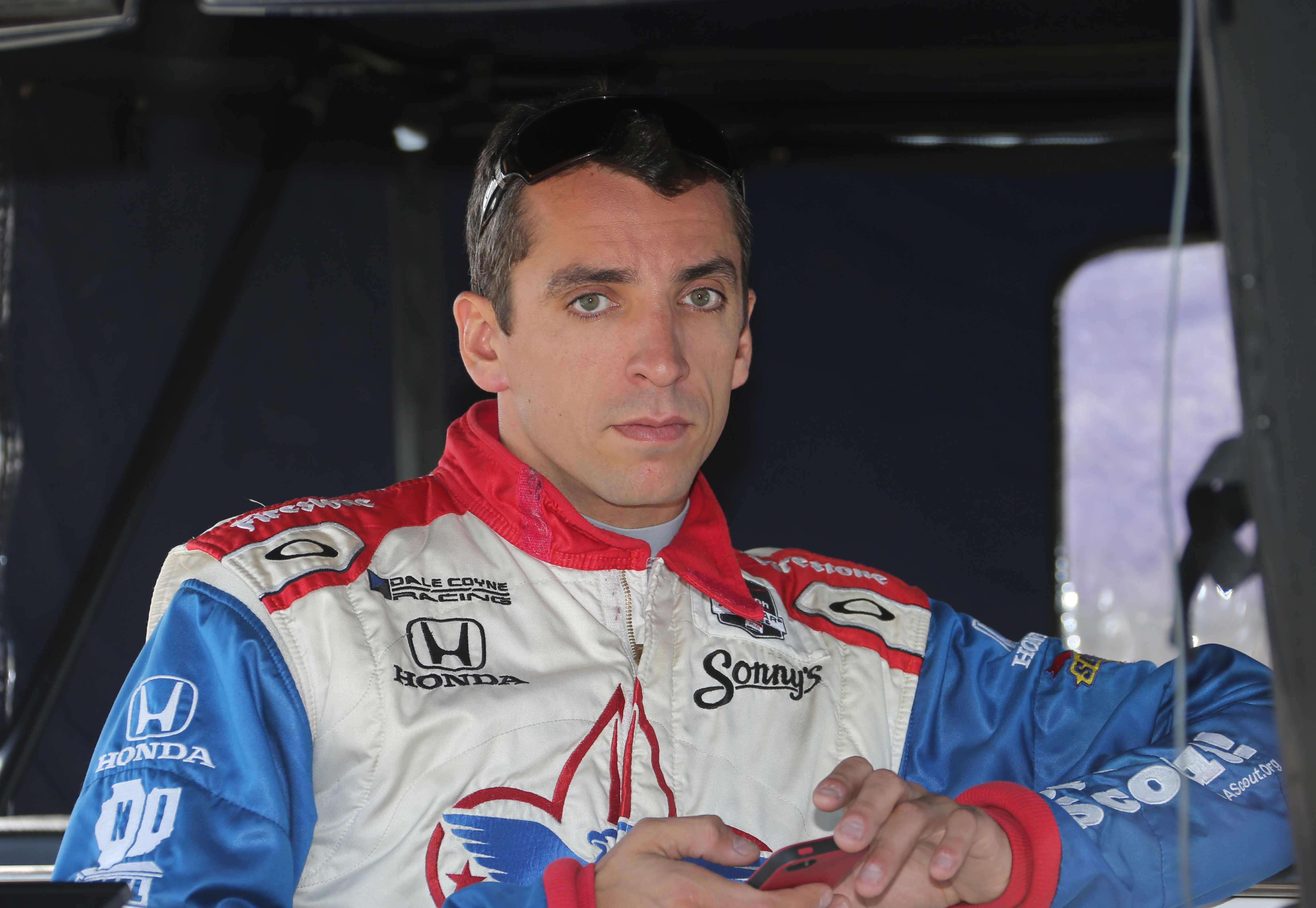Justin Wilson, 37, died from his injuries after flying debris hit him following a crash at the Pocono circuit in the  IndyCar 500 series. Photos: AP