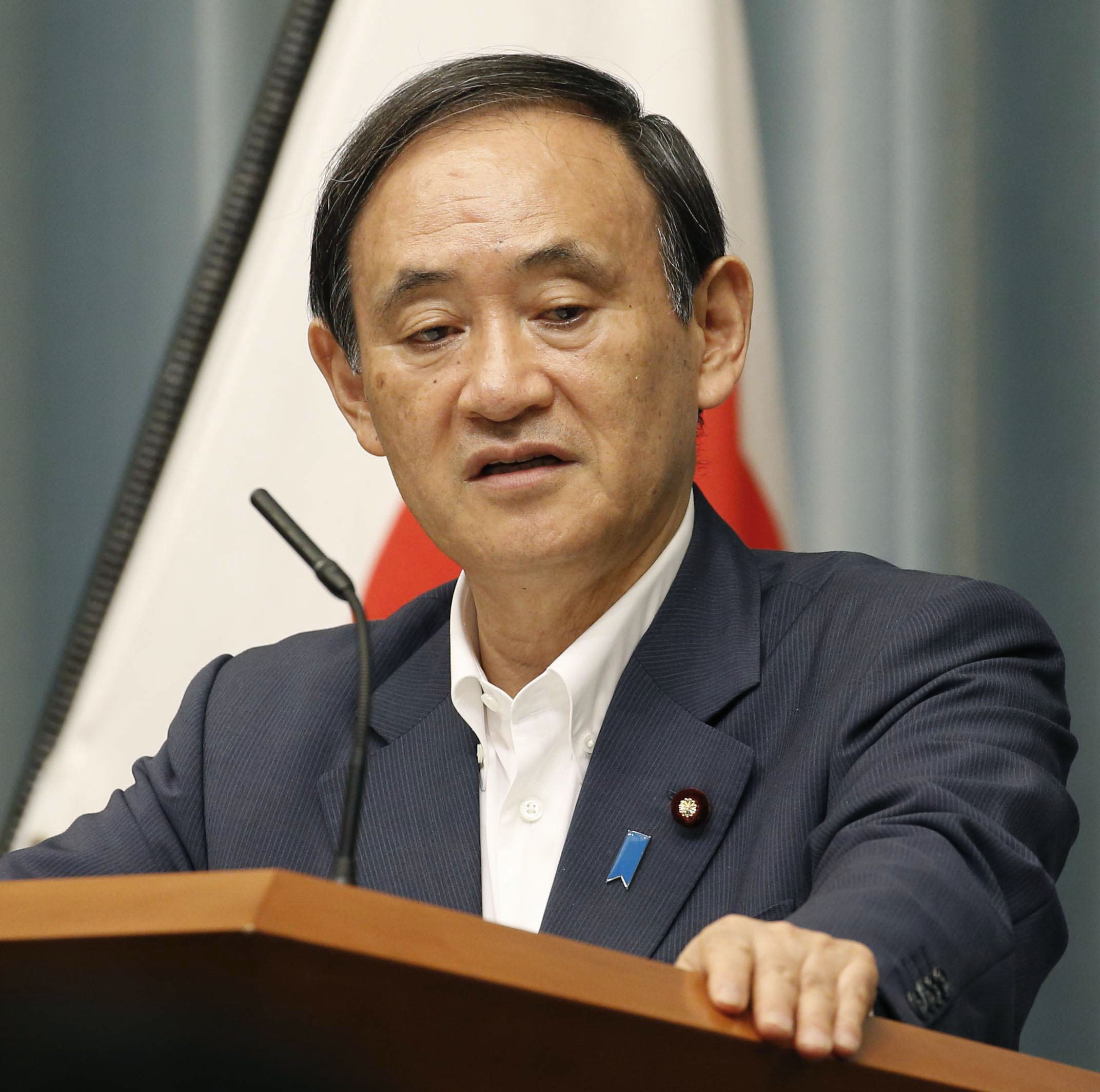 Chief Cabinet Secretary Yoshihide Suga says Japan's position is that China should not "excessively focus on its unfortunate past". Photo: Kyodo 